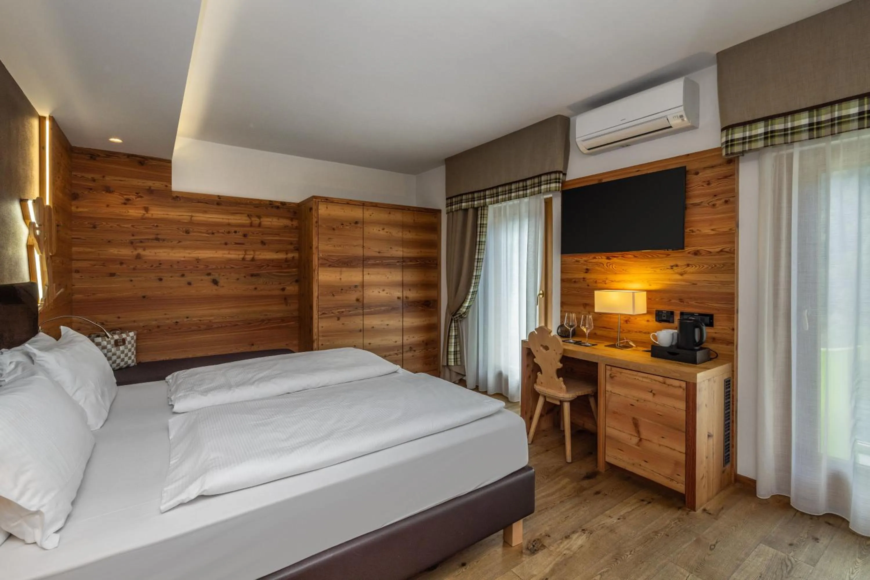 Bed in Hotel Ravelli Luxury Spa