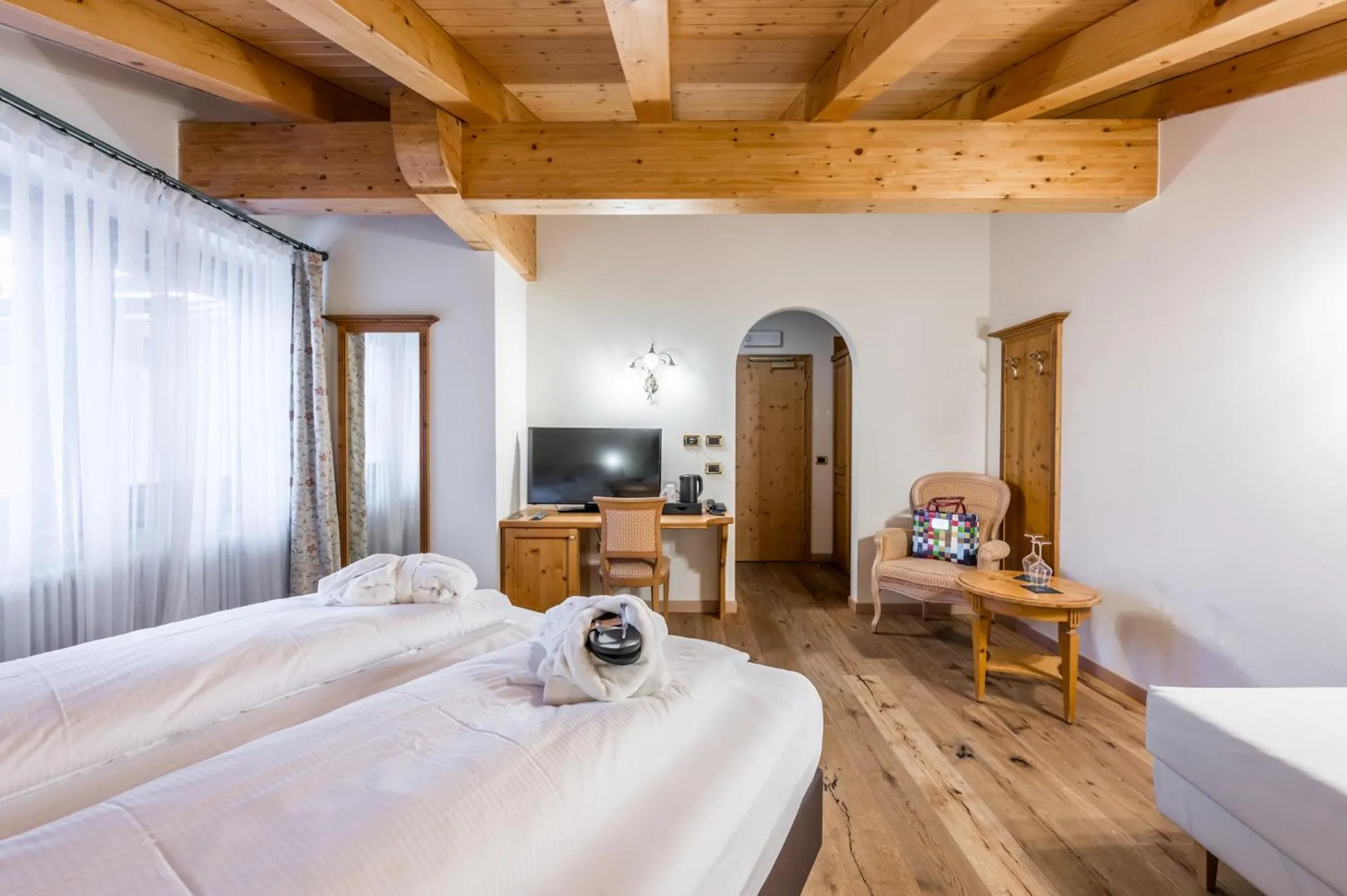 Bed in Hotel Ravelli Luxury Spa