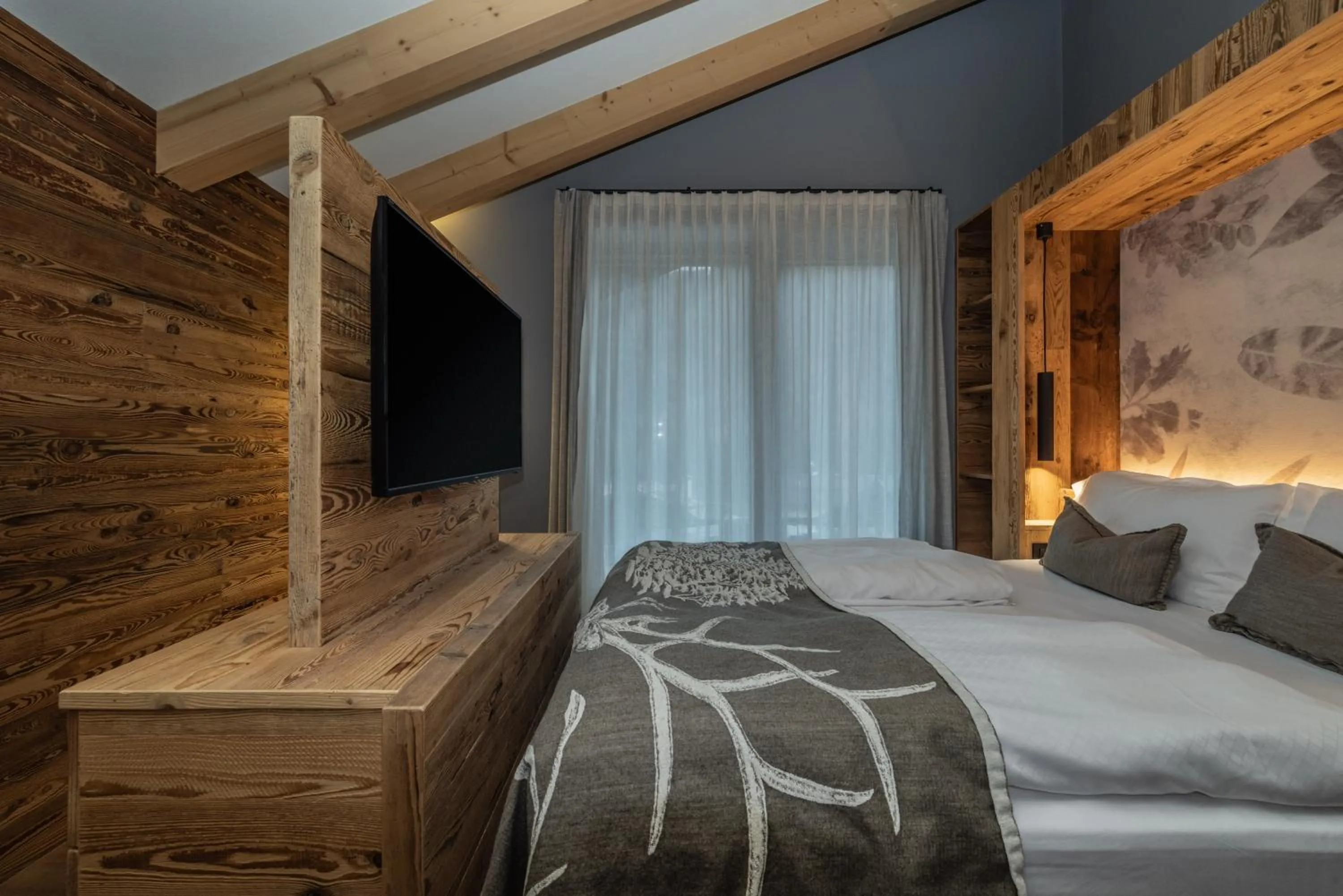 Bed in Hotel Ravelli Luxury Spa