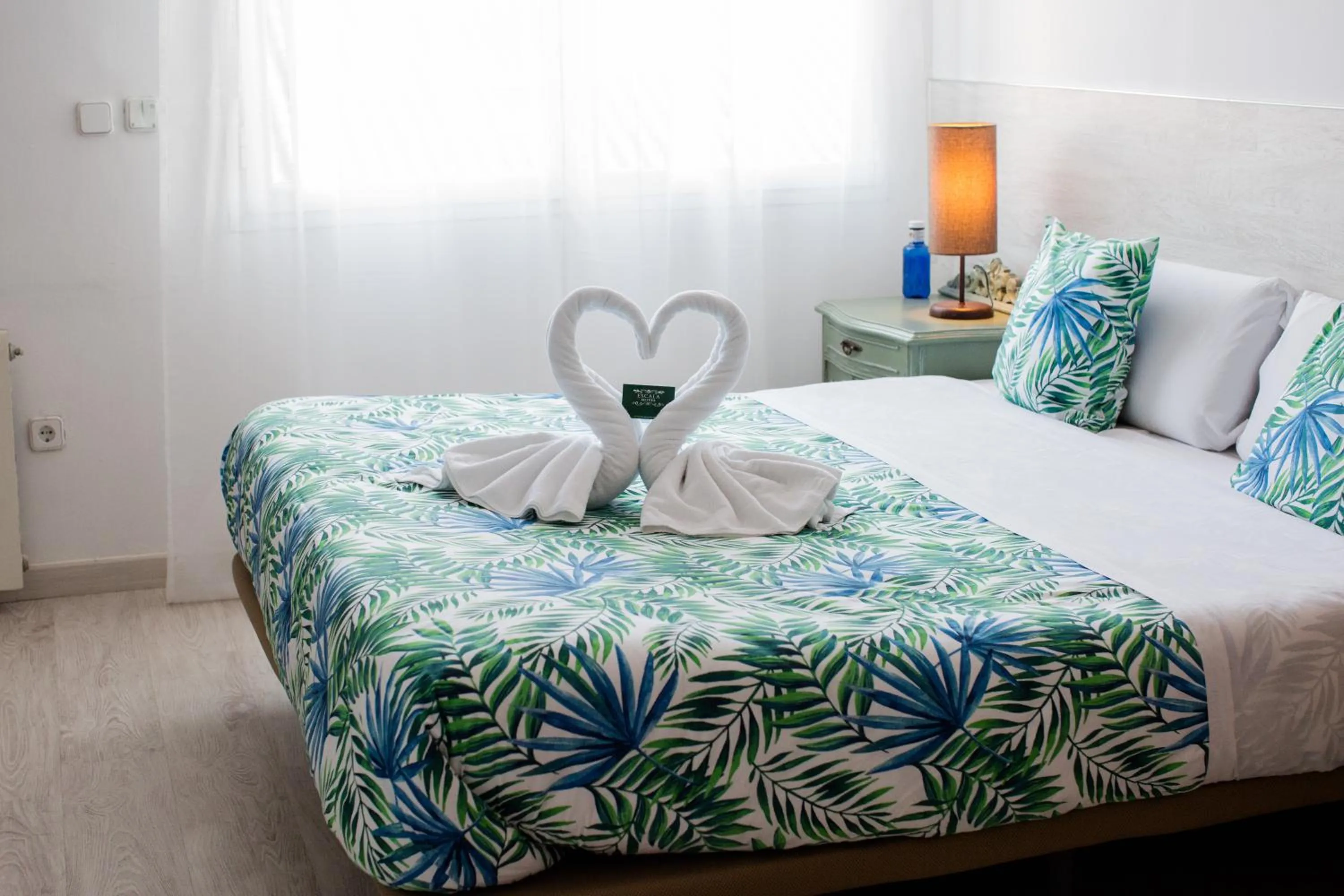 Bed in Hostal Escala Suites