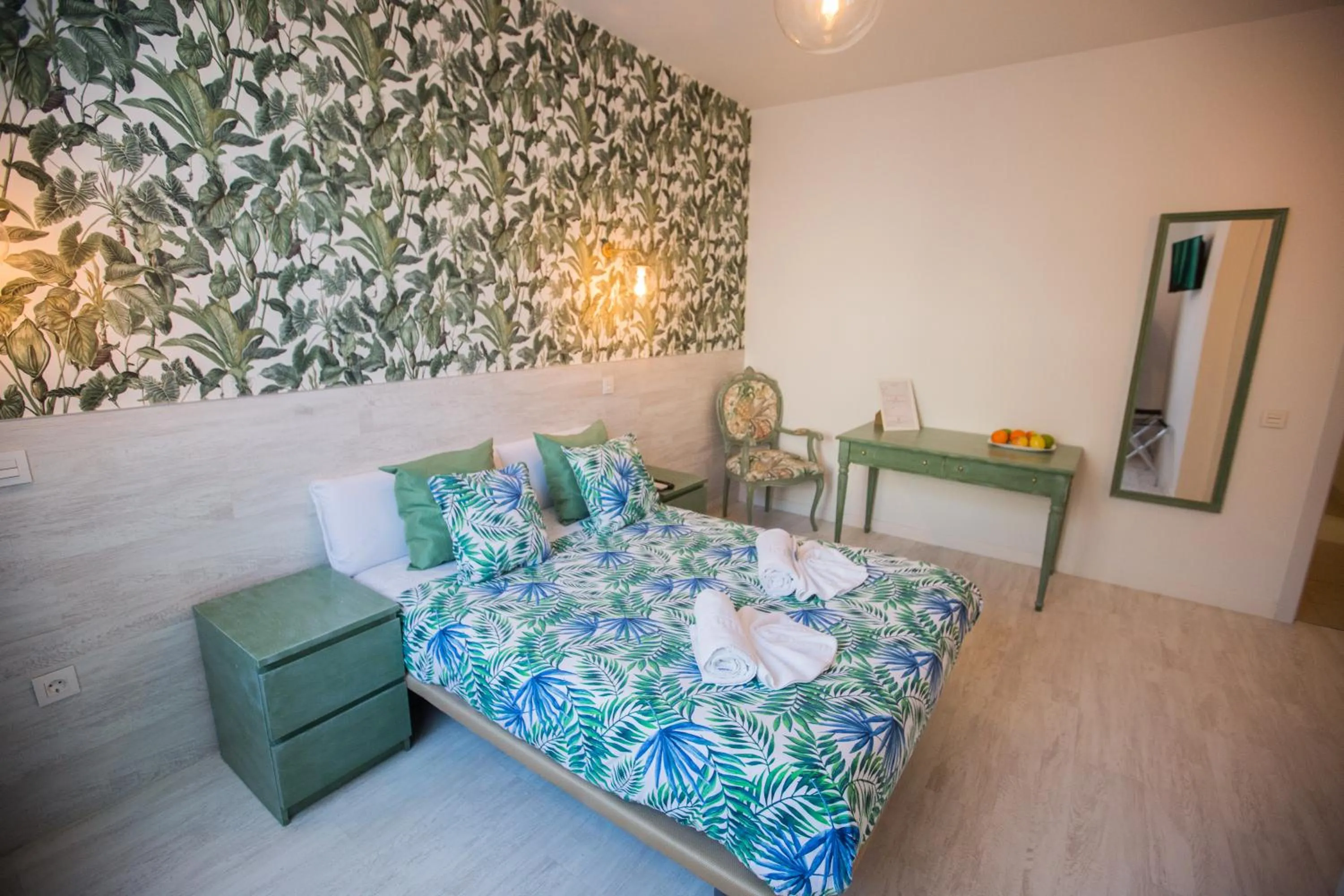 Bed in Hostal Escala Suites