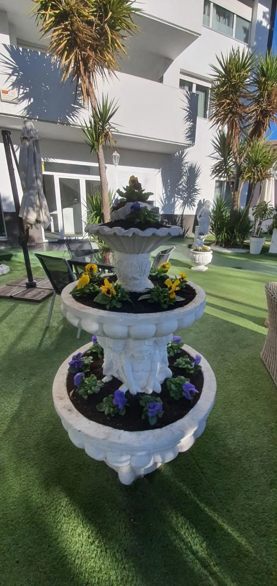 Garden in Hostal Escala Suites