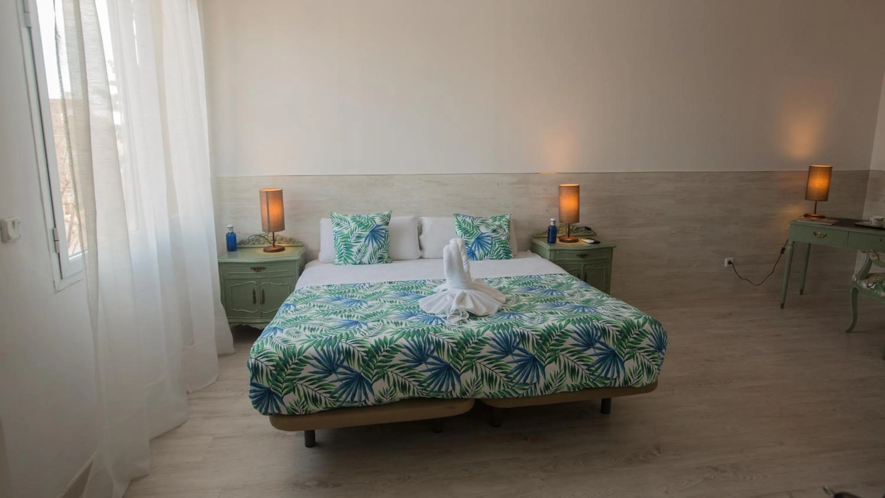 Bed in Hostal Escala Suites