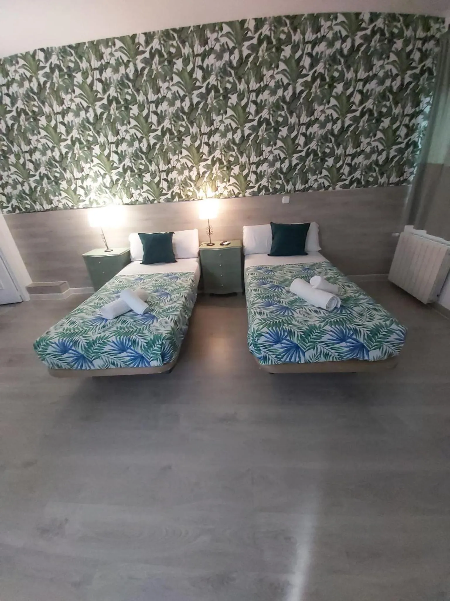 Bed in Hostal Escala Suites