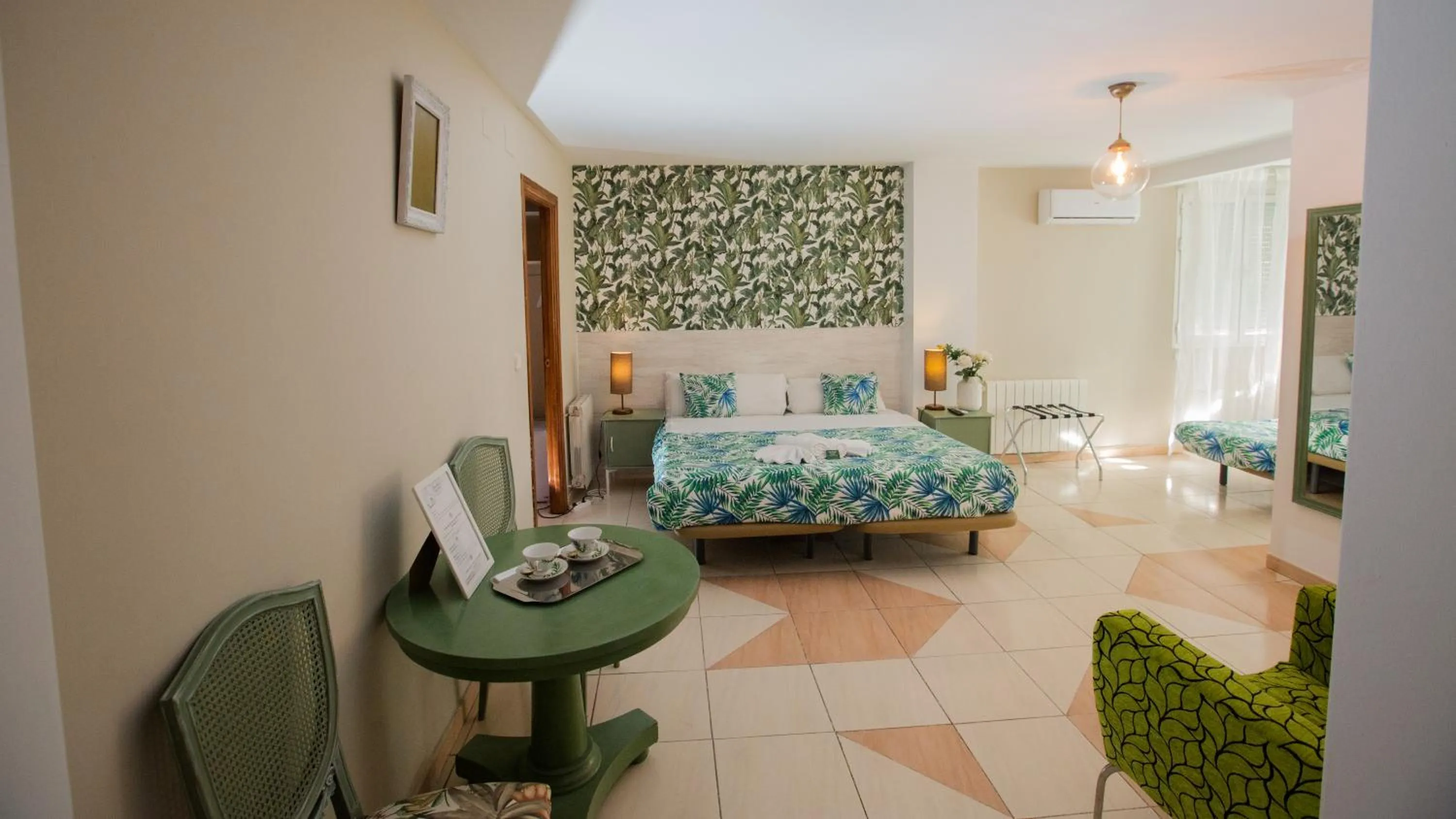 Bed in Hostal Escala Suites