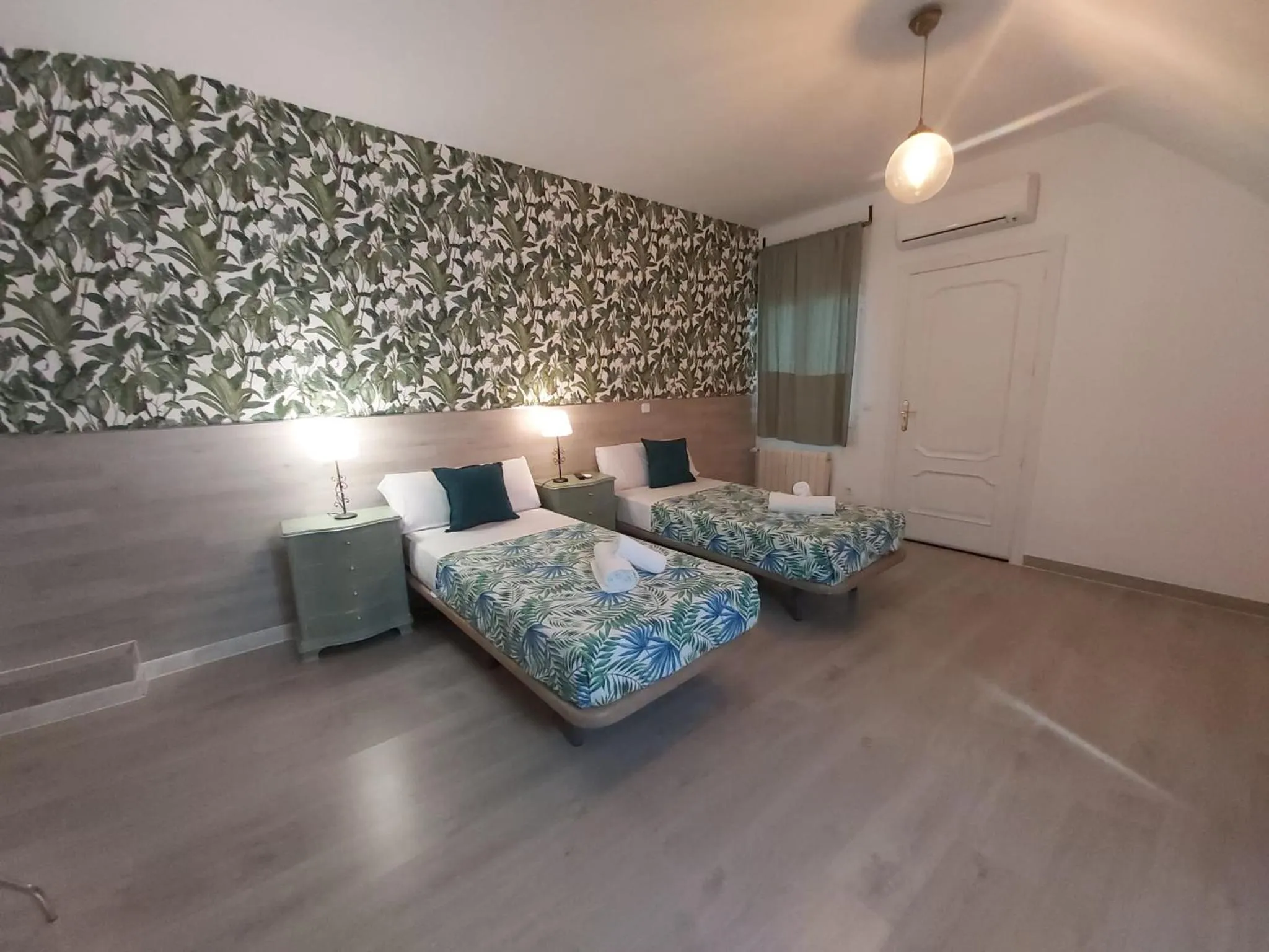 Bed in Hostal Escala Suites