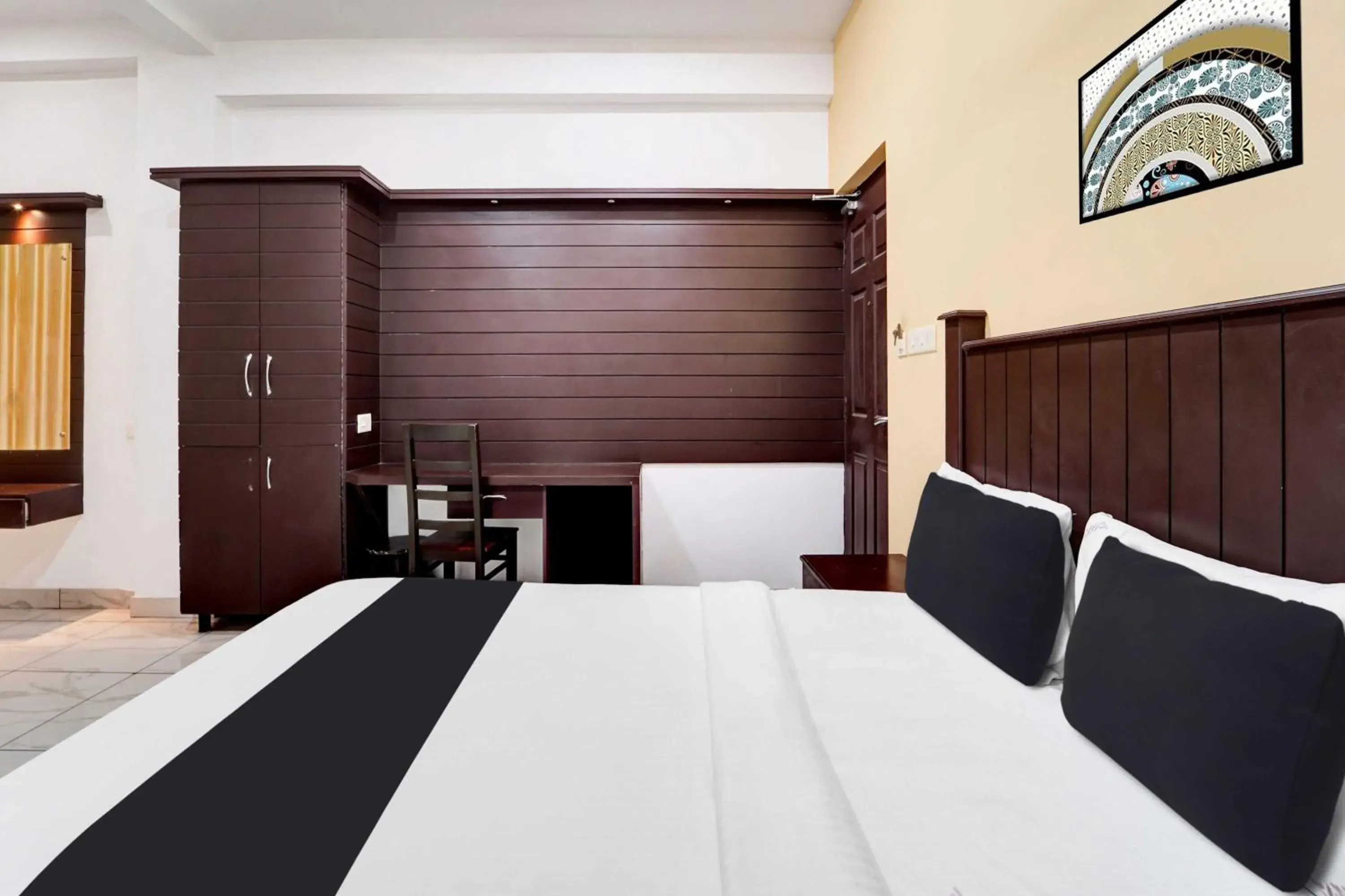 Classic Triple Room - single occupancy in Hotel O Calvathy Road Near Fort Kochi Classic Triple Room - single occupancy in Hotel O Calvathy Road Near Fort Kochi