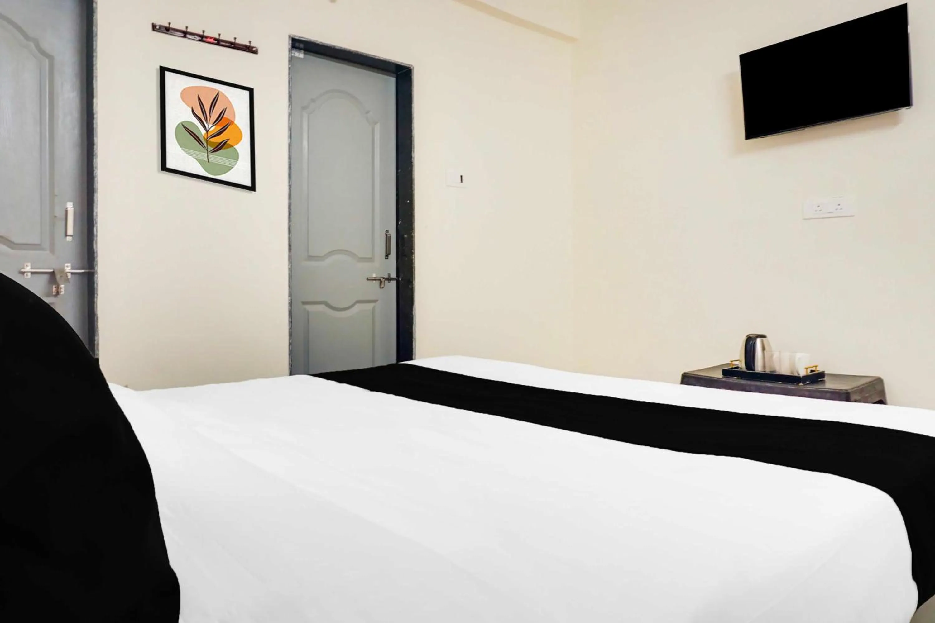 Bedroom, Bed in Hotel O Laxmi Chowk Hinjewadi