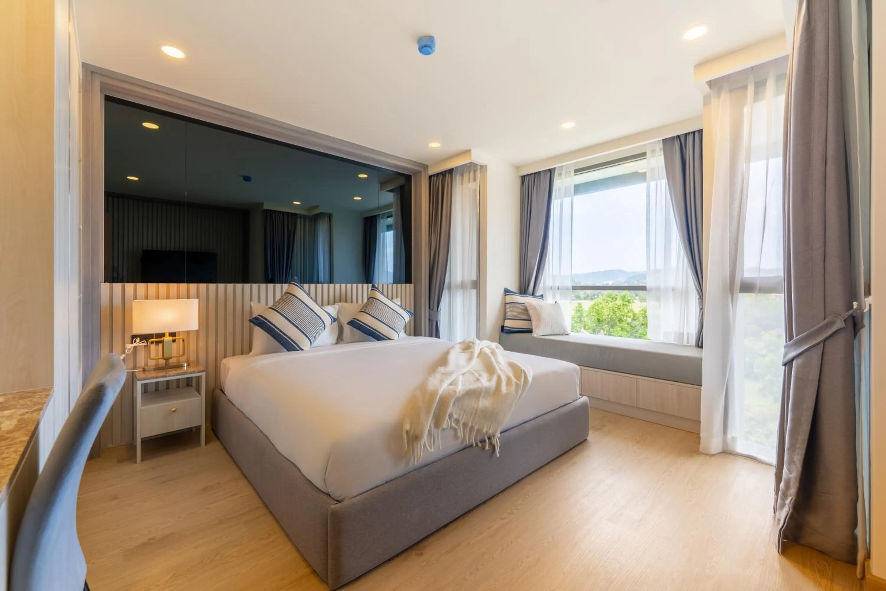 Bed in The Ozone Residences Bangtao