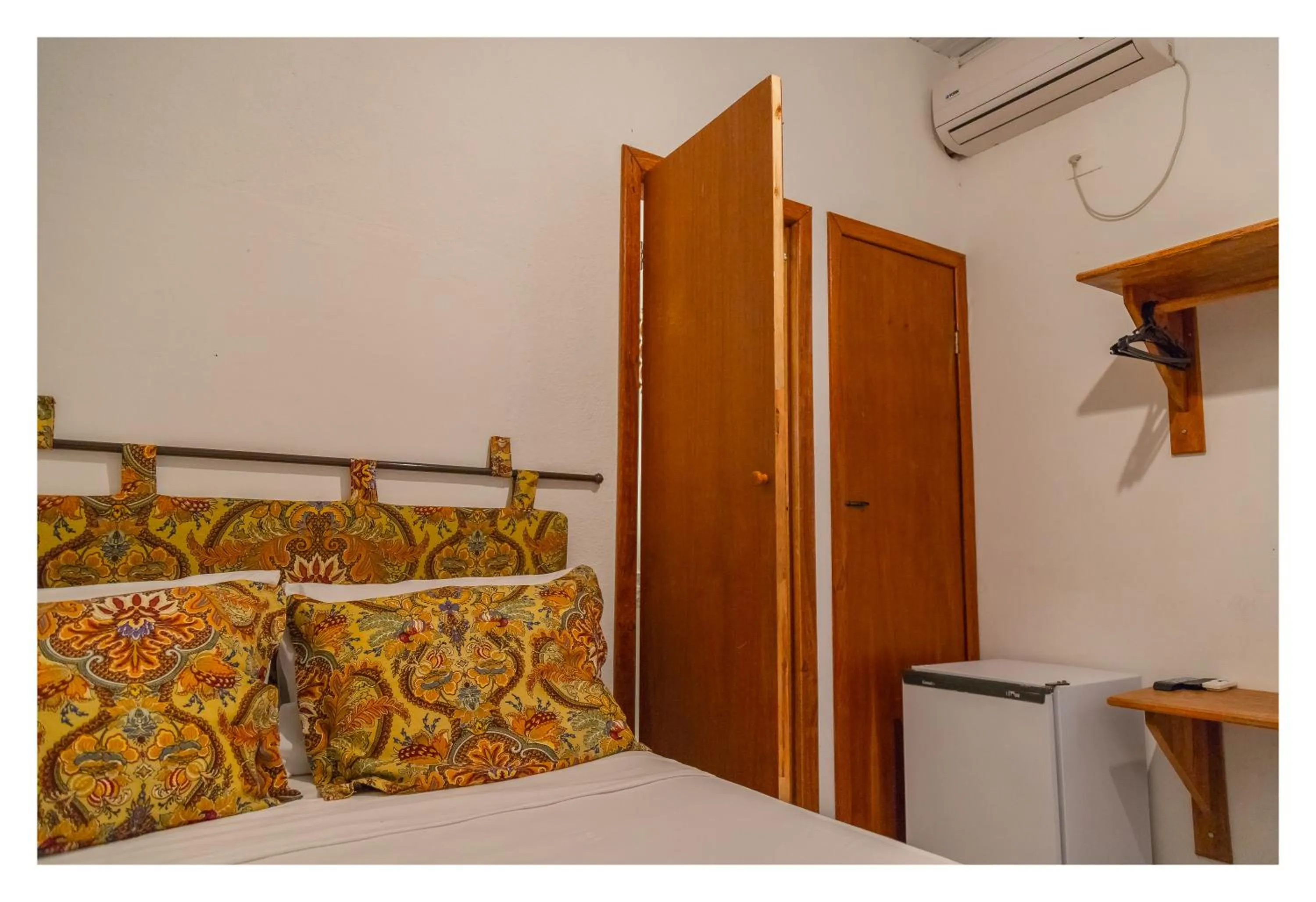 Bed in Pousada Cravo e Canela