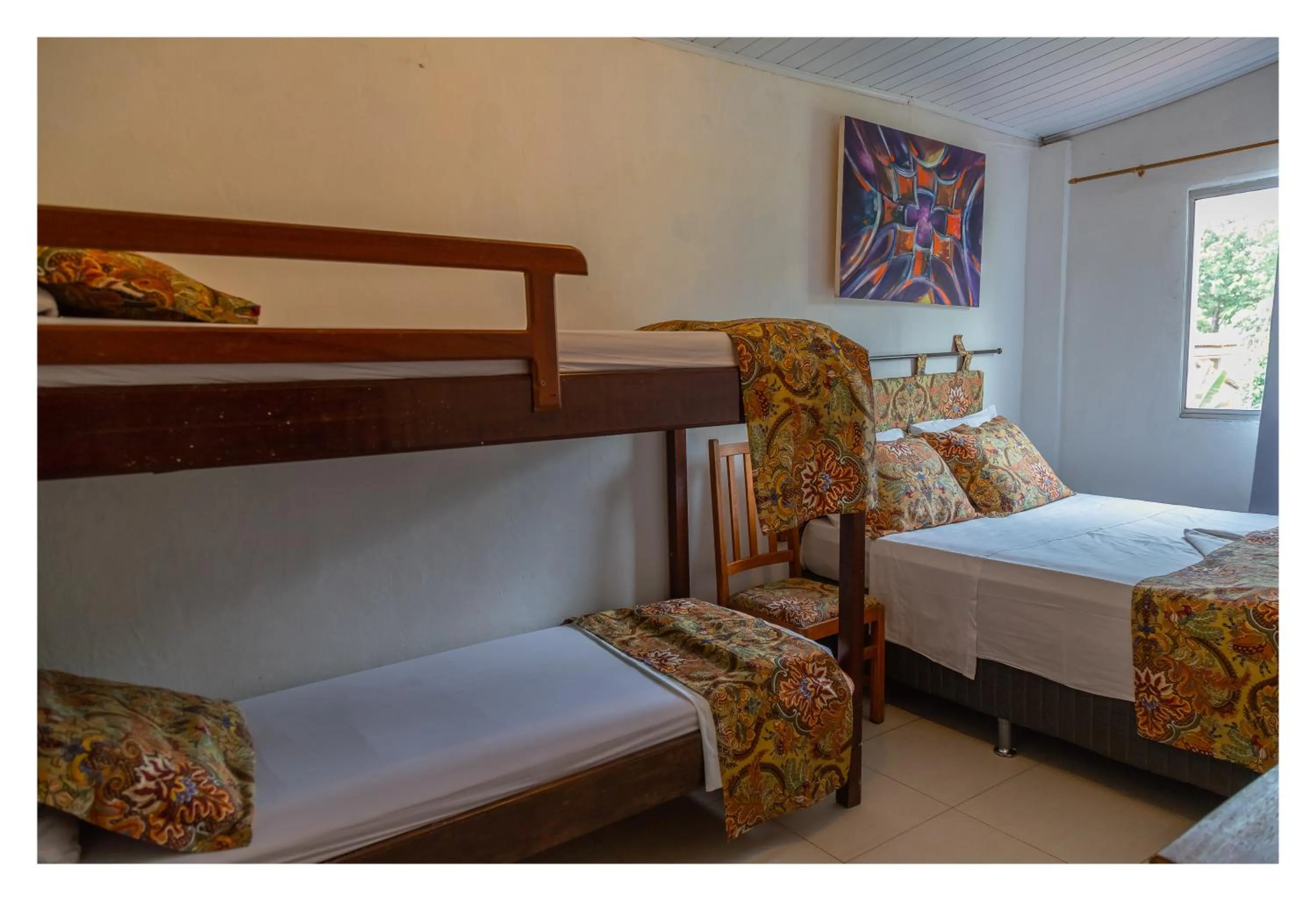 Bed in Pousada Cravo e Canela