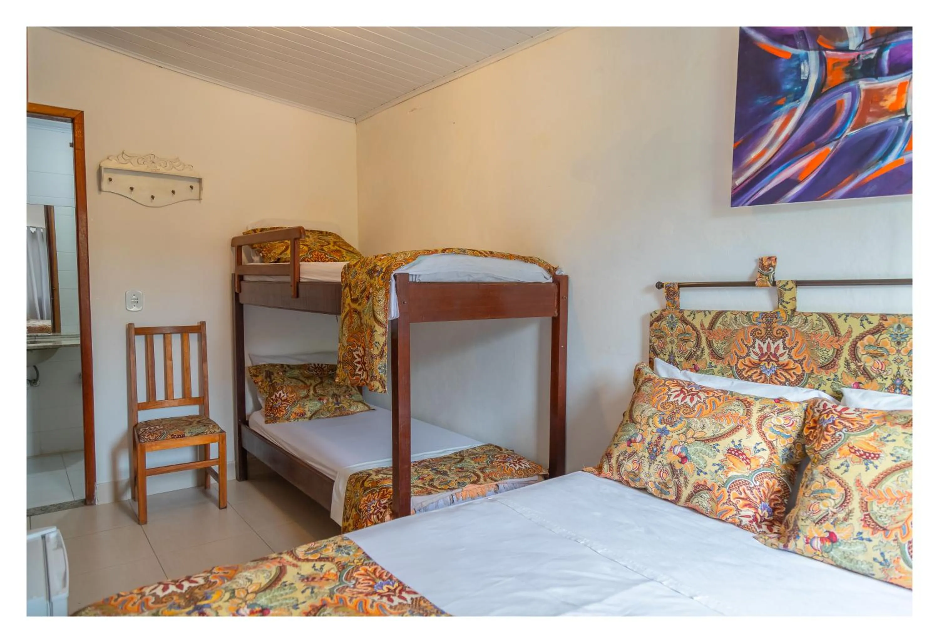 Bed in Pousada Cravo e Canela