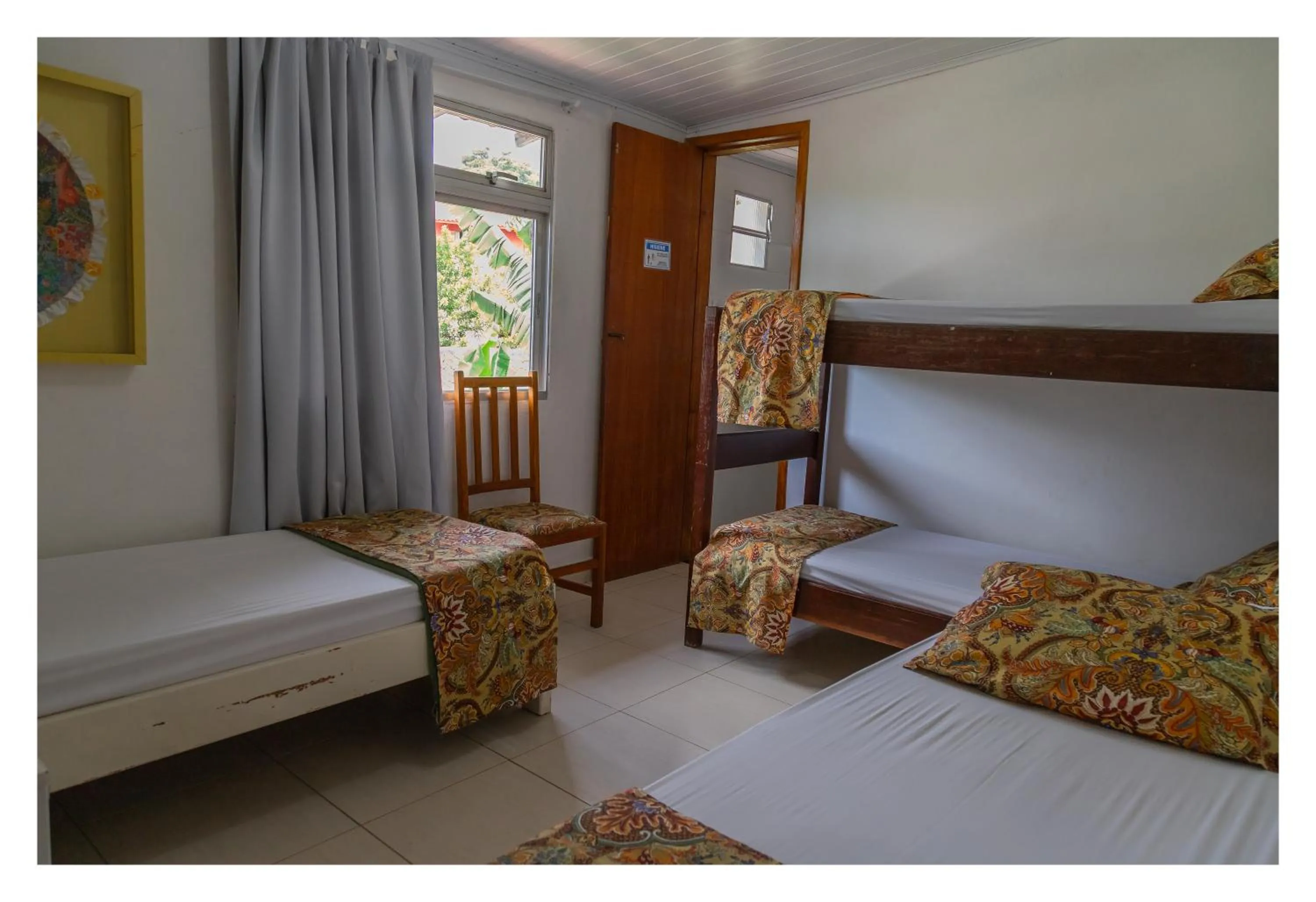 Bed in Pousada Cravo e Canela