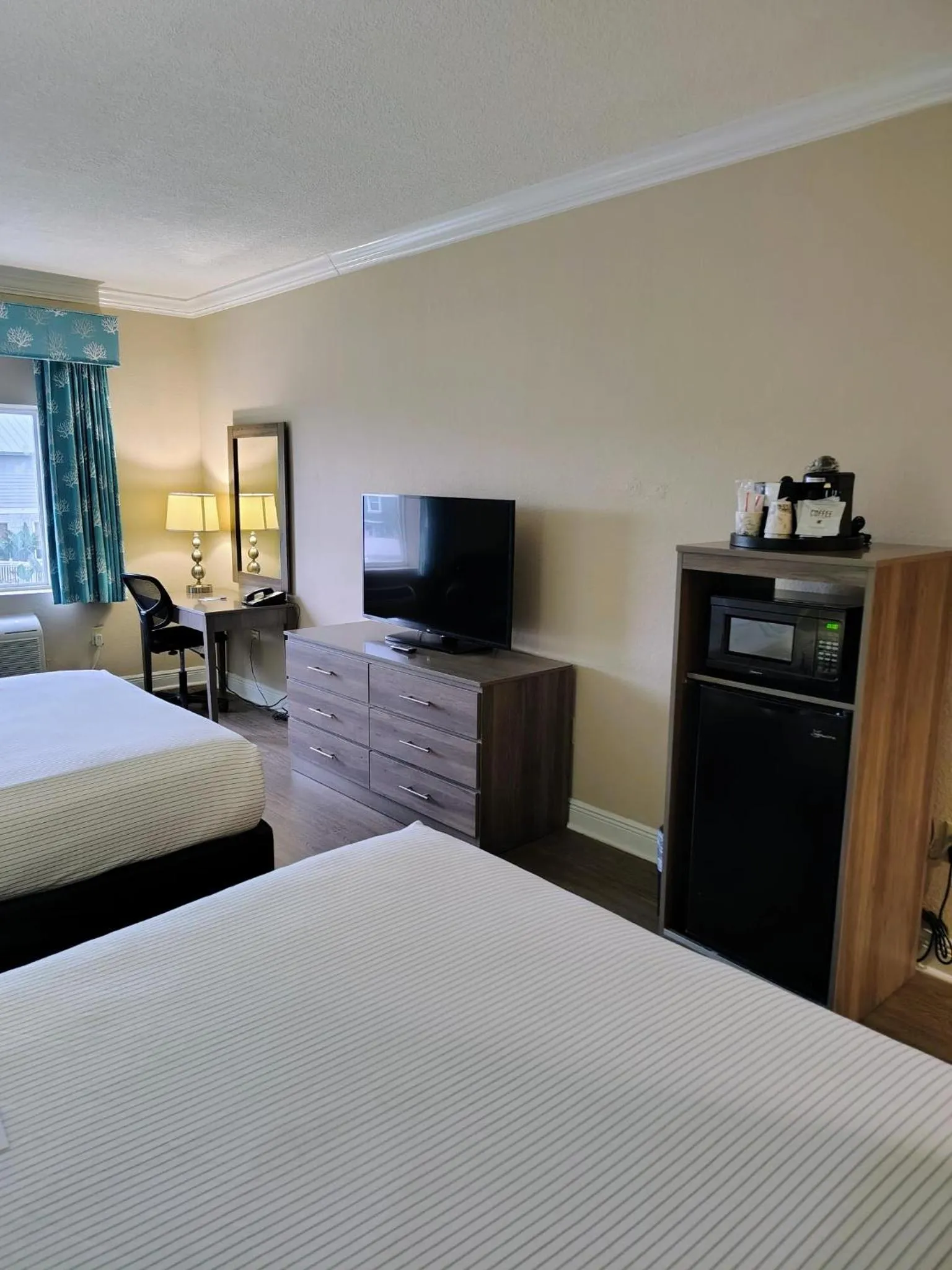 Bed in Amelia Hotel at the Beach