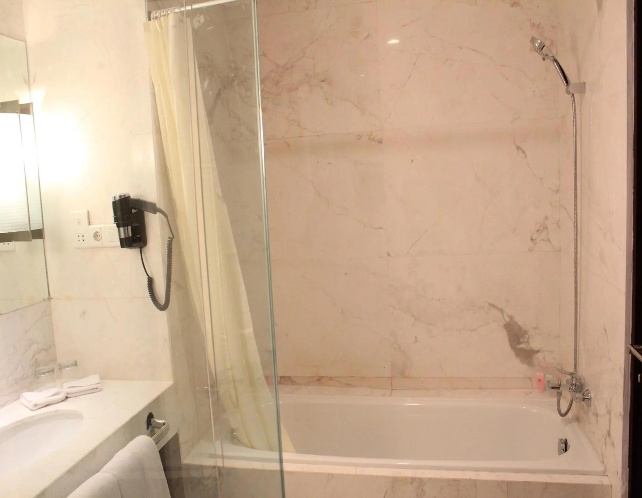 Bathroom in Grand Mercure Solo Baru