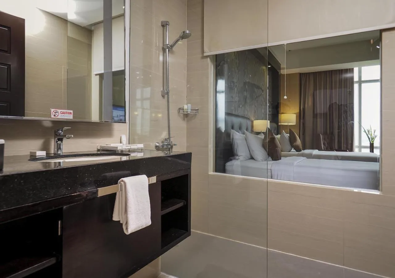 Bathroom in Grand Mercure Solo Baru