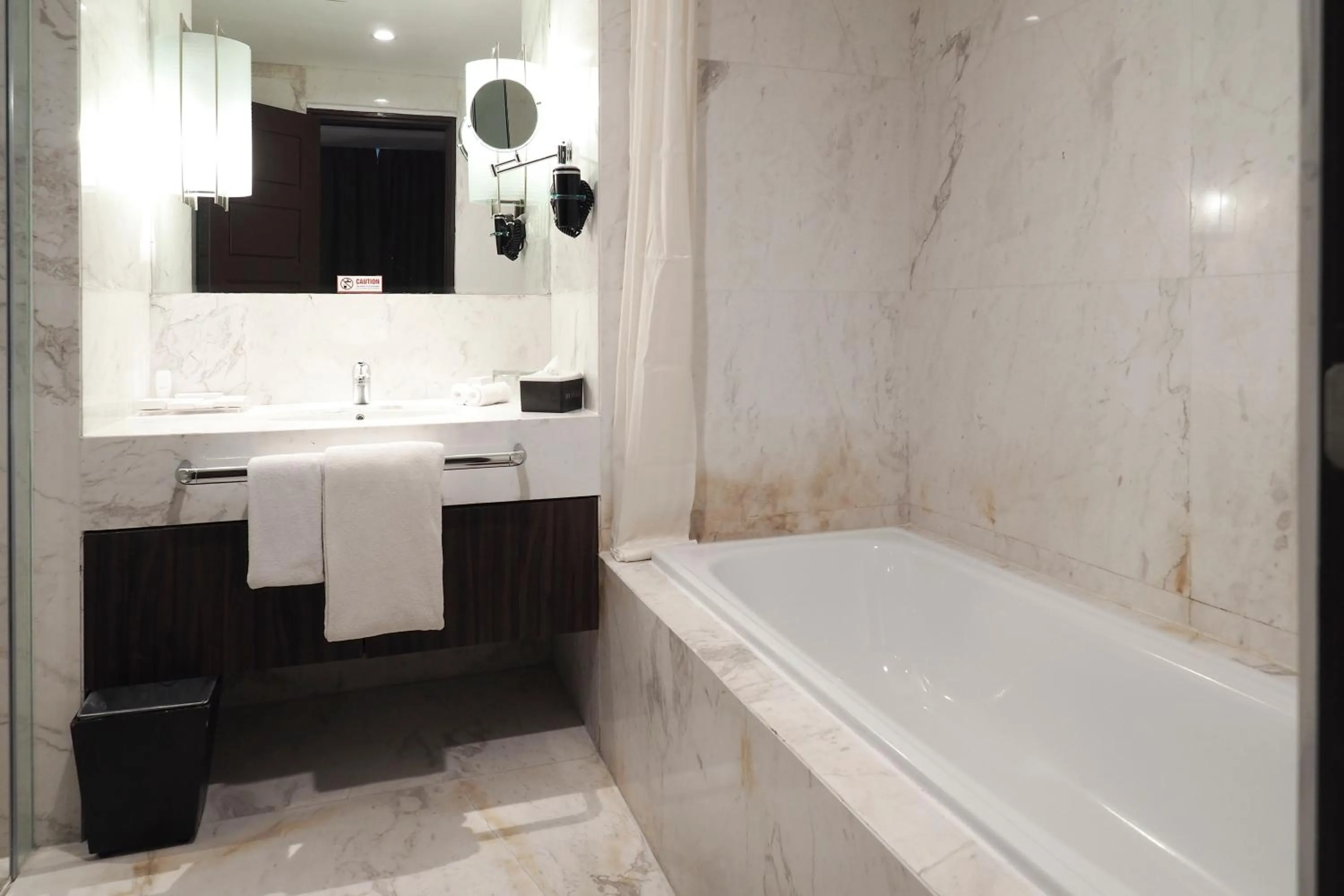 Bathroom in Grand Mercure Solo Baru
