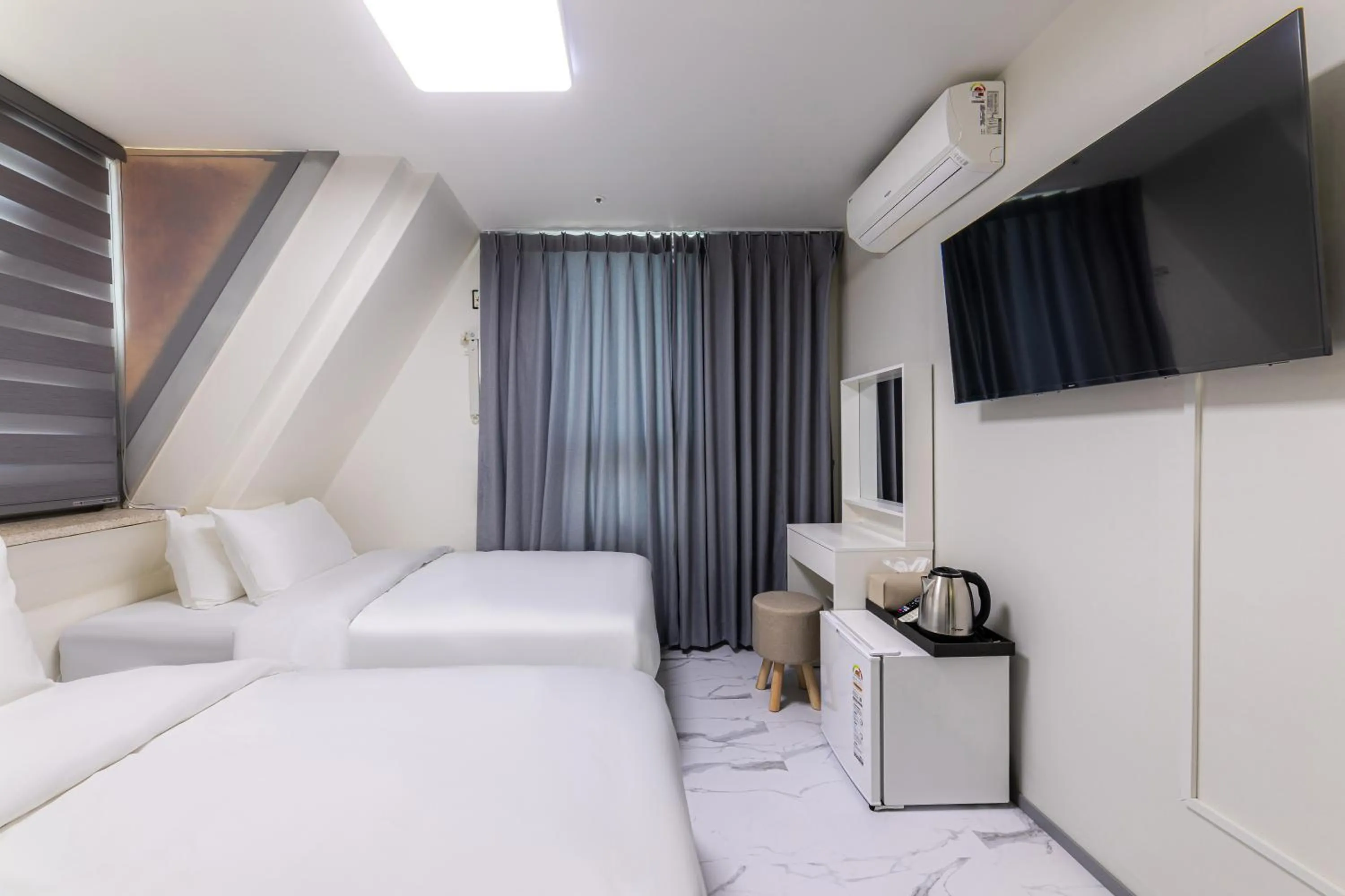 Bed in MJ Hotel Jongno