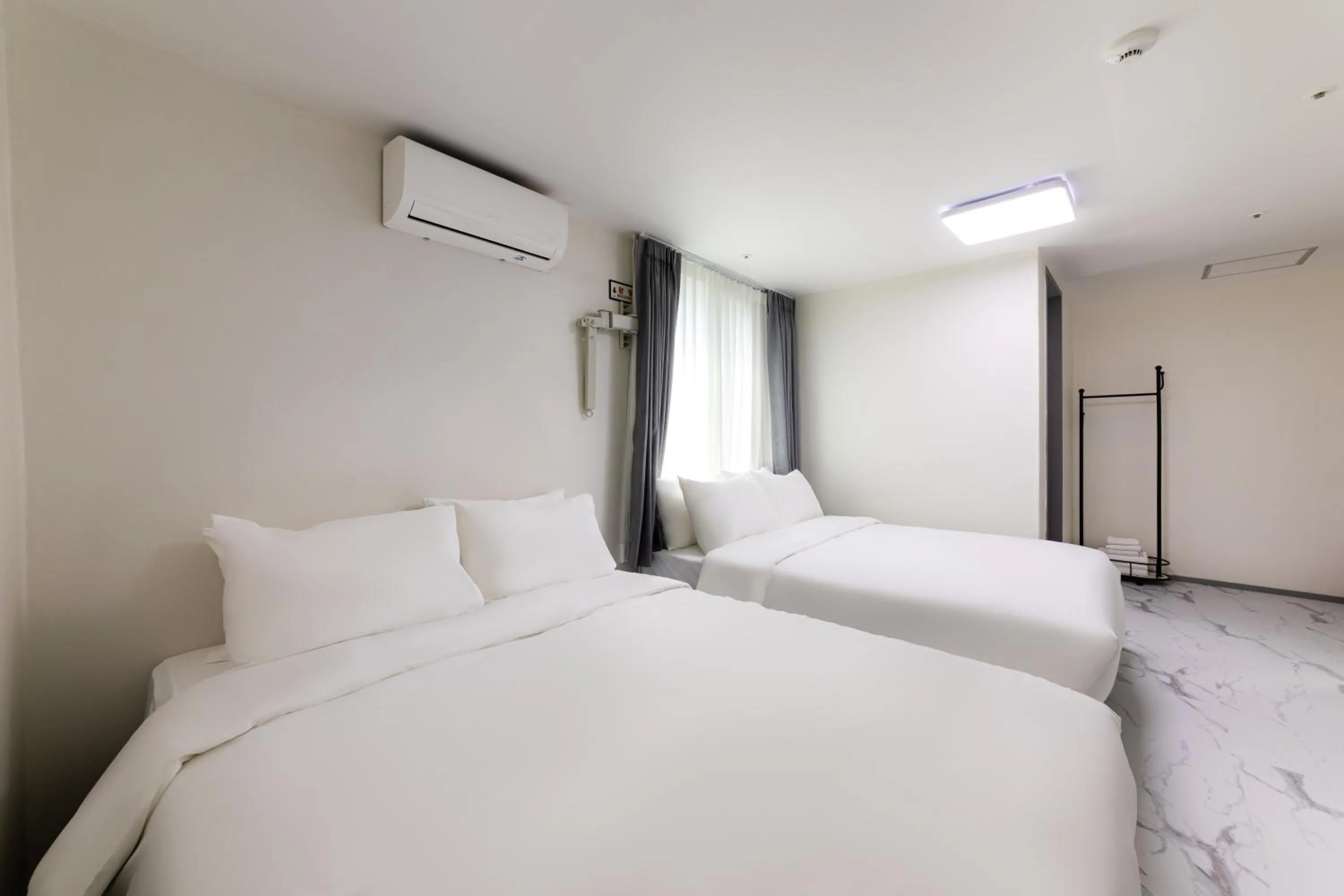 Bed in MJ Hotel Jongno