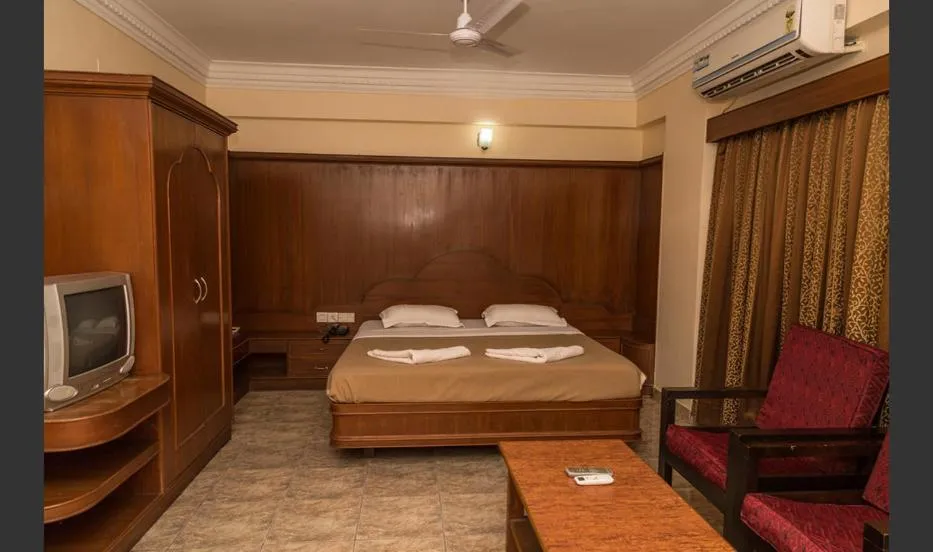 Photo of the whole room, Bed in Hotel Sri Ram Residency
