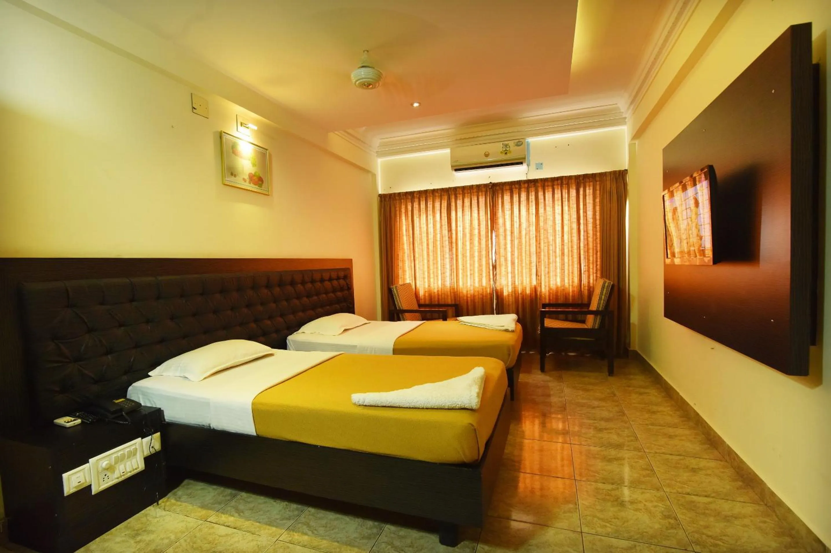 Photo of the whole room, Bed in Hotel Sri Ram Residency