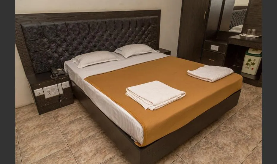 Photo of the whole room, Bed in Hotel Sri Ram Residency