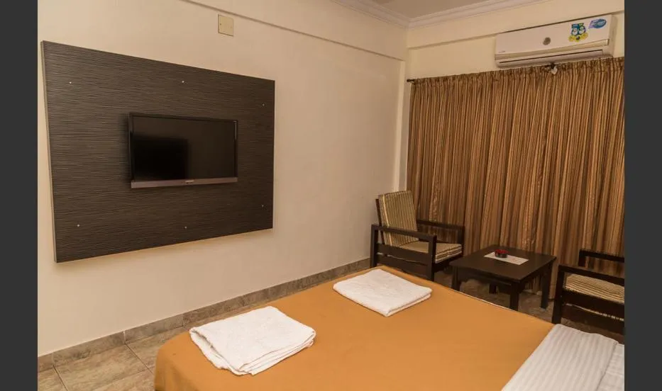Photo of the whole room, Bed in Hotel Sri Ram Residency