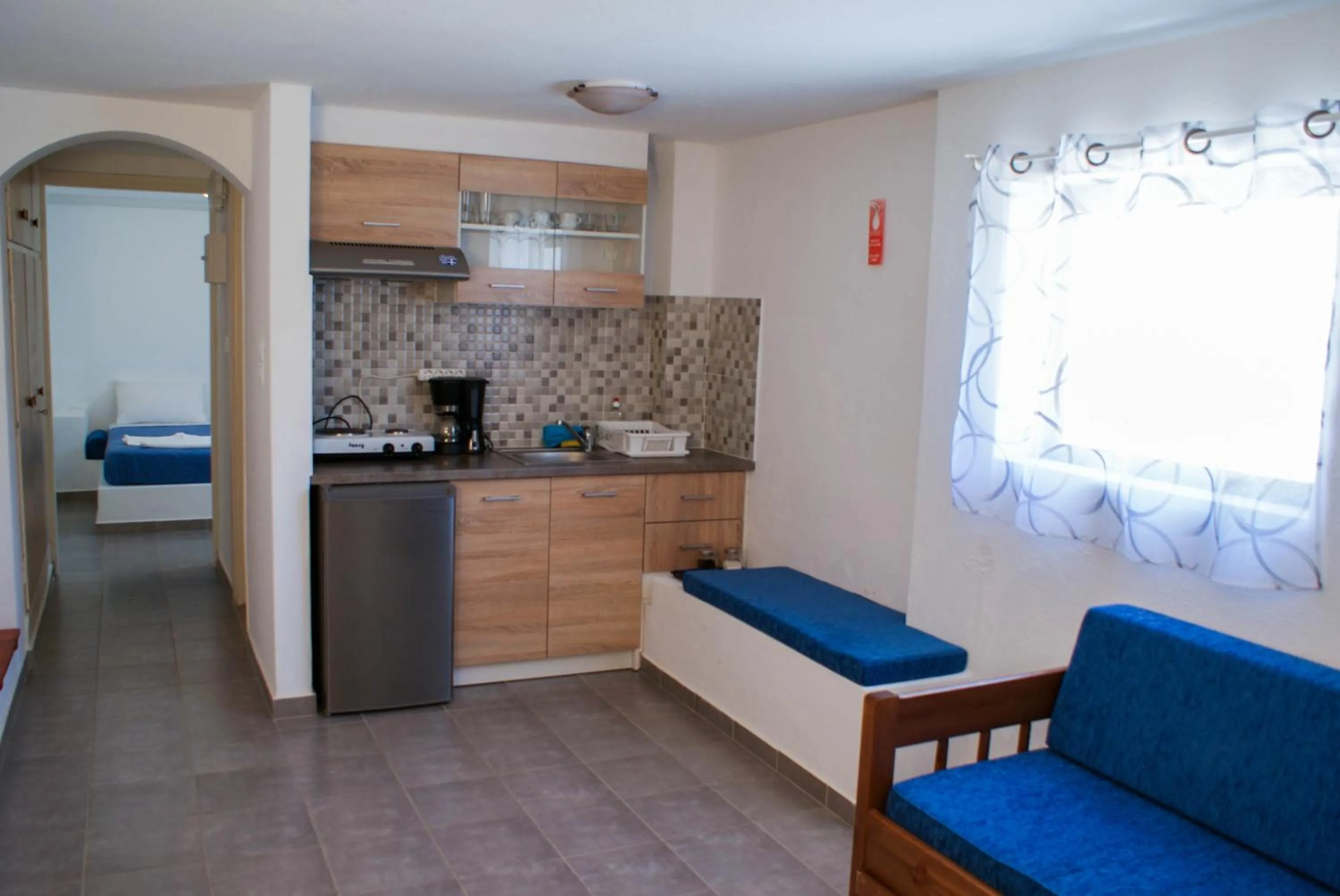 Kitchen or kitchenette in Blue Era Apartments