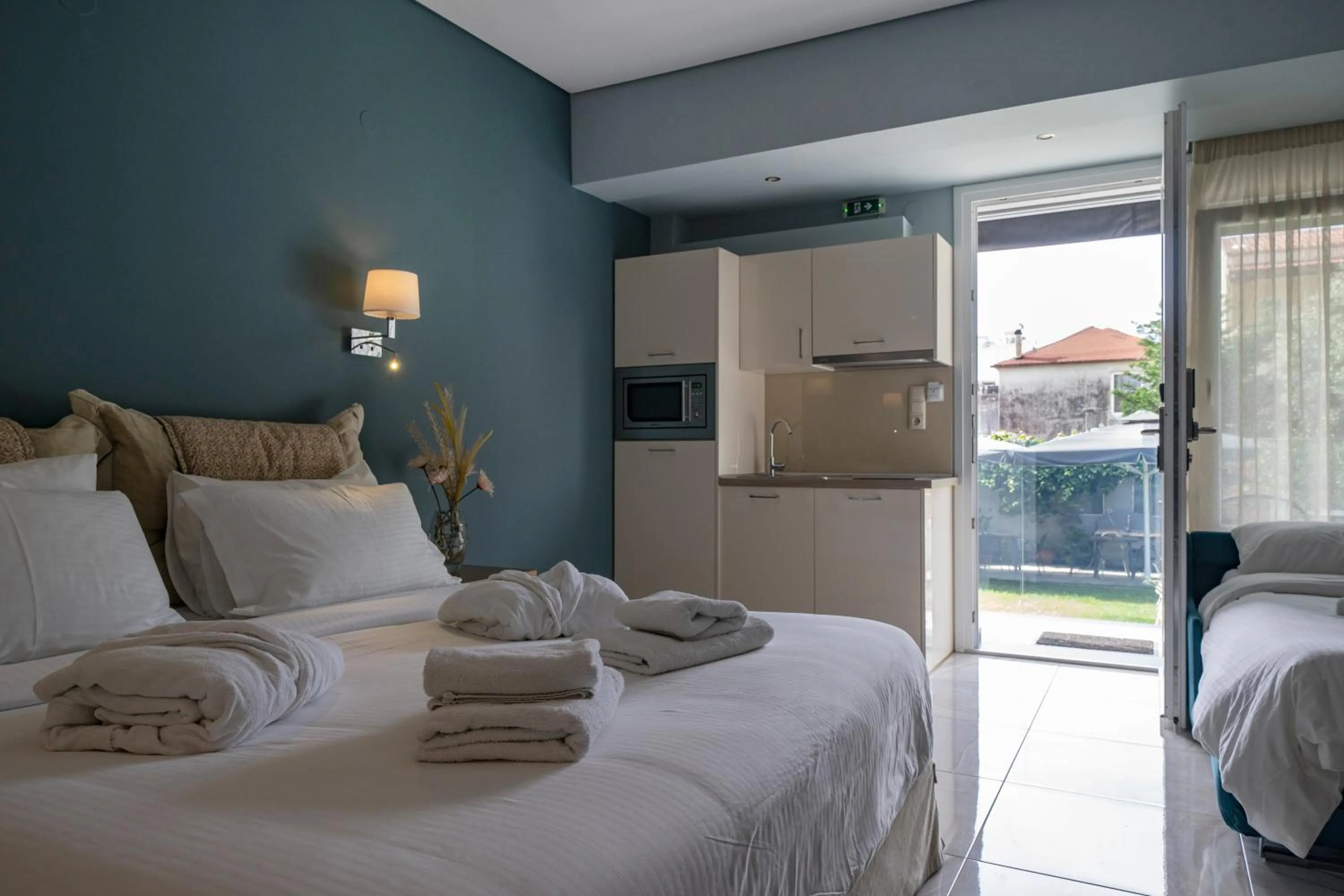 Bed in Edem Luxury Apartments