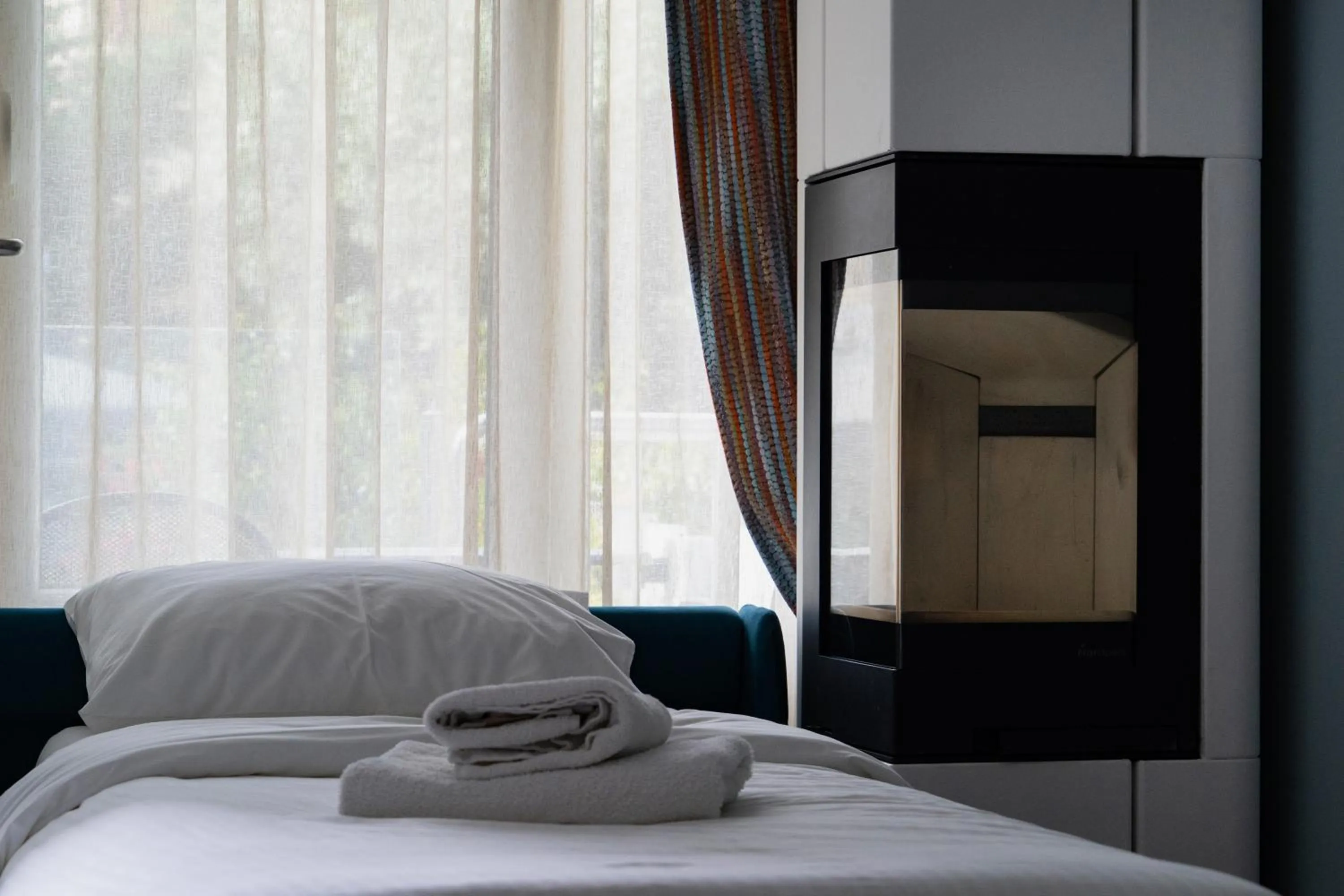 Bed in Edem Luxury Apartments