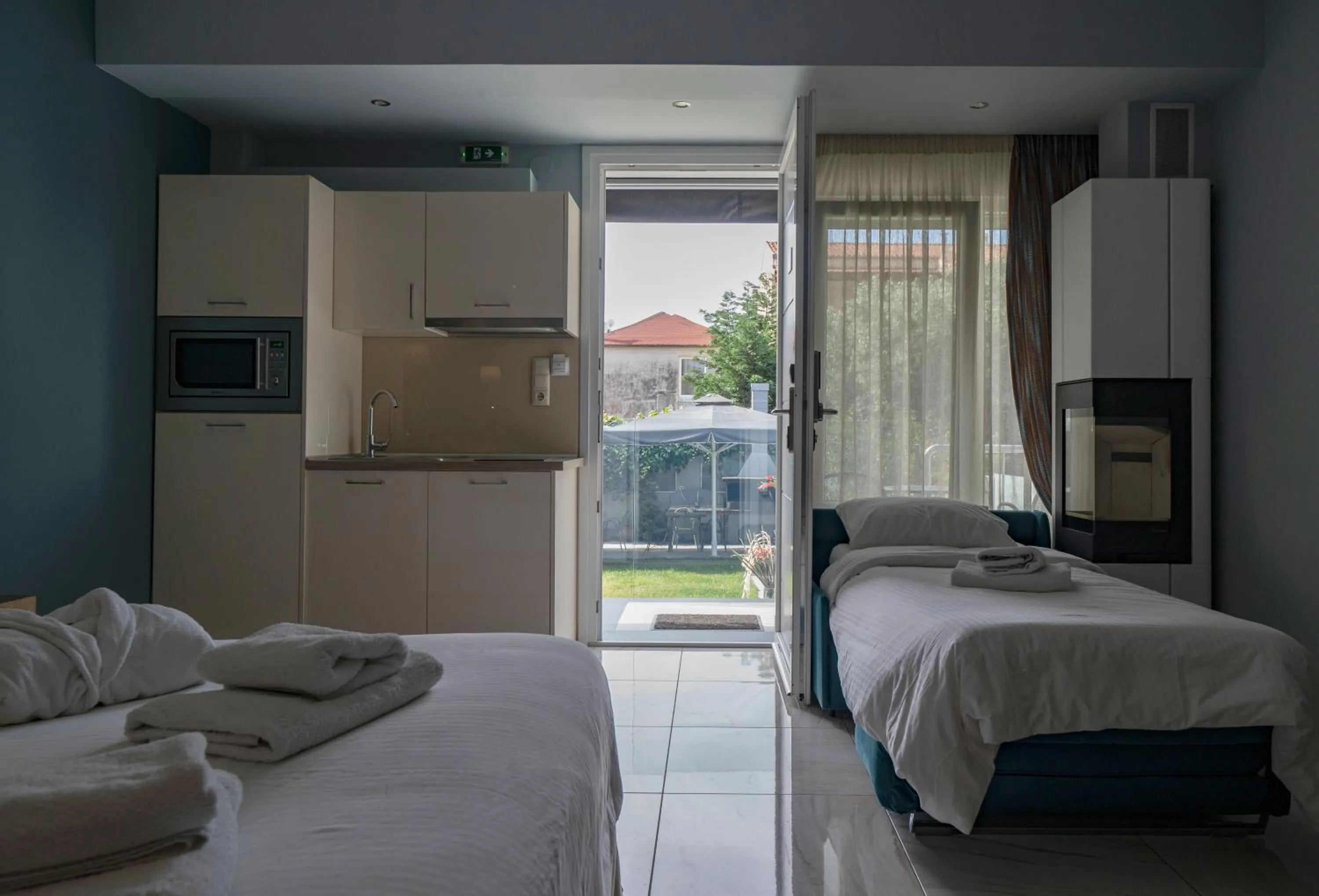 Bed in Edem Luxury Apartments