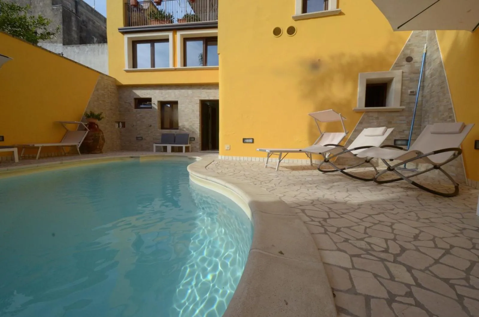 Swimming pool in B&B Corte Dei Figuli