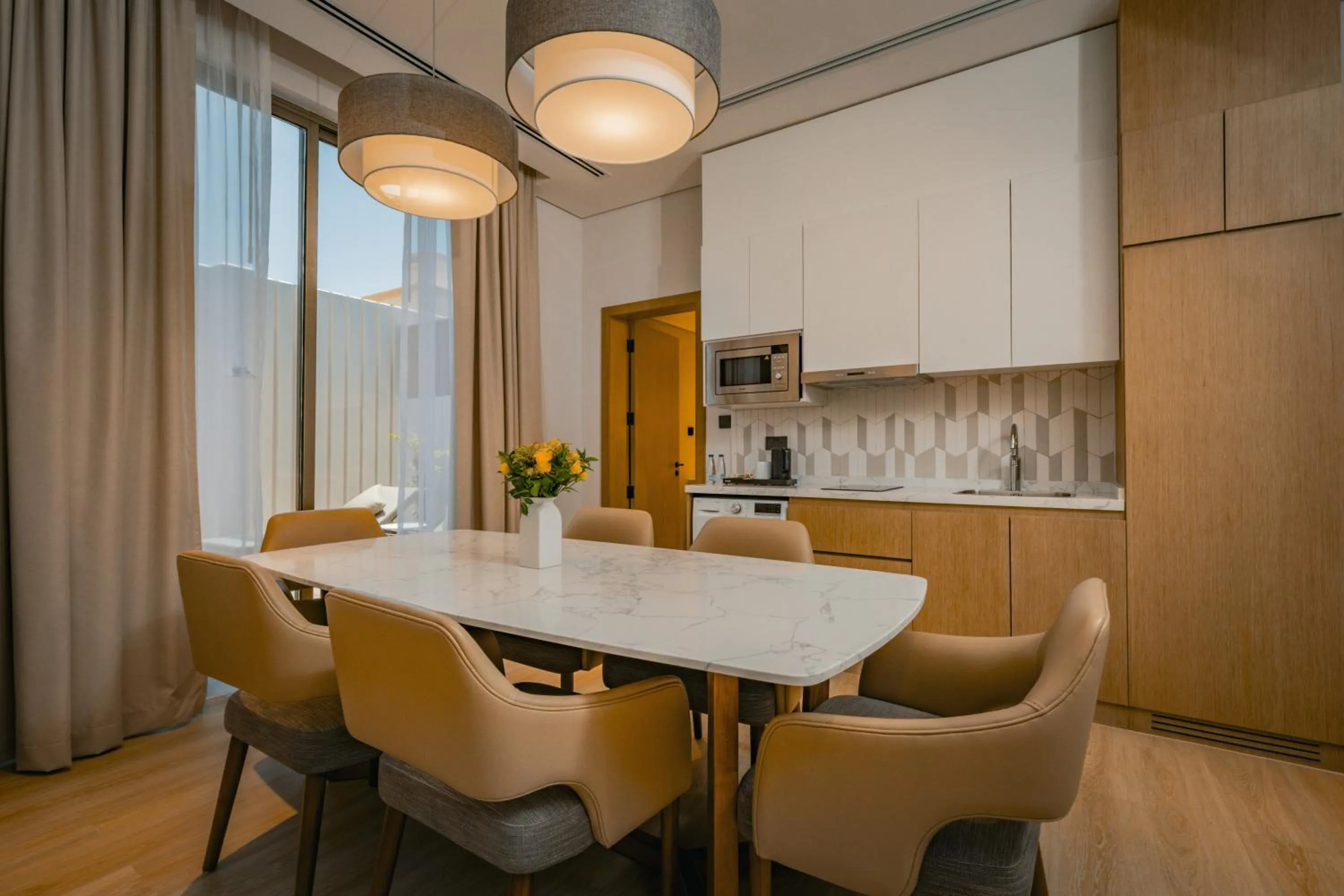 Kitchen or kitchenette in First Grand Hotel