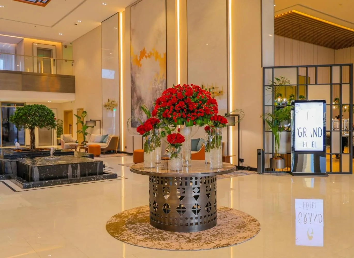 Lobby or reception in First Grand Hotel