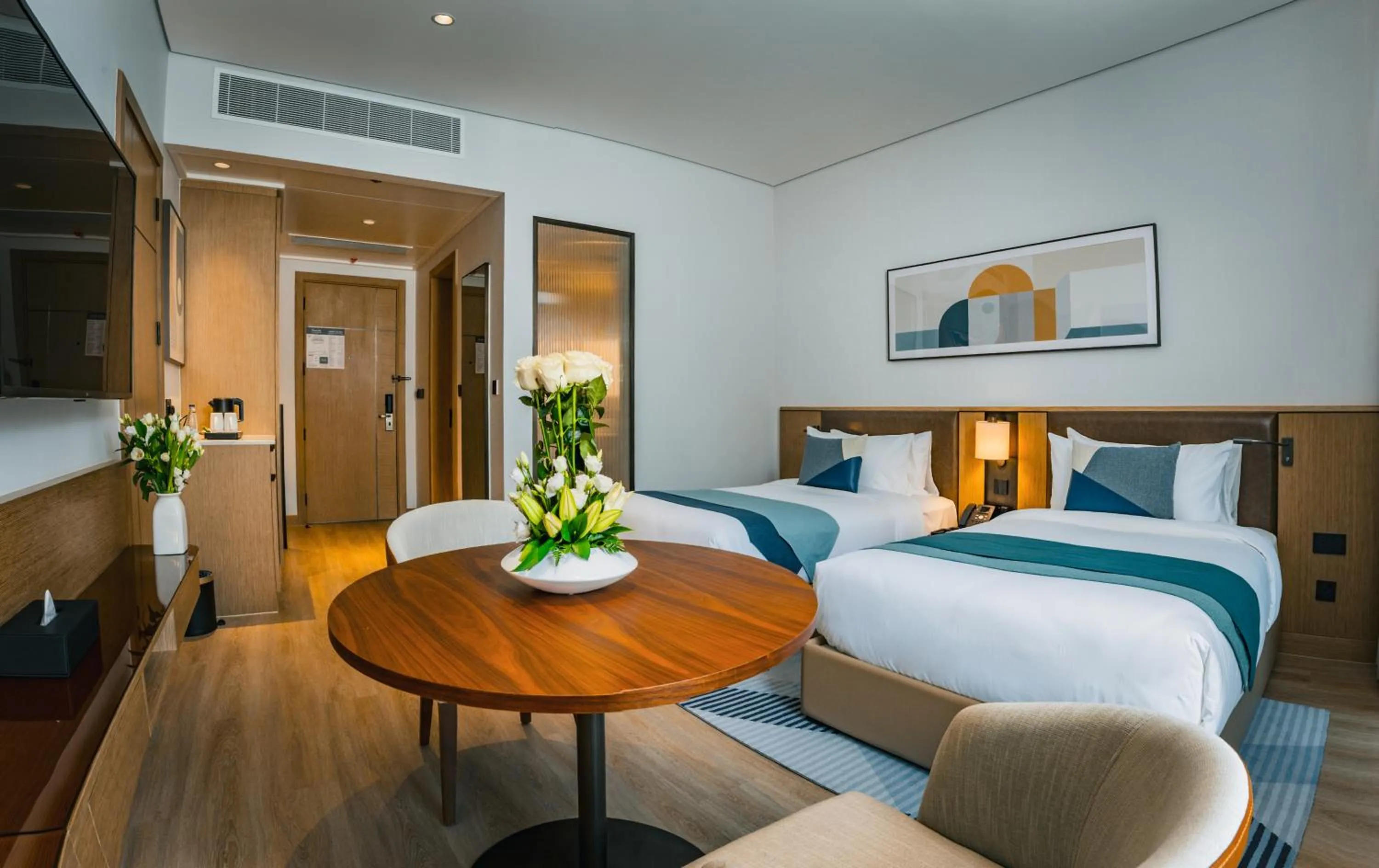 Bed in First Grand Hotel