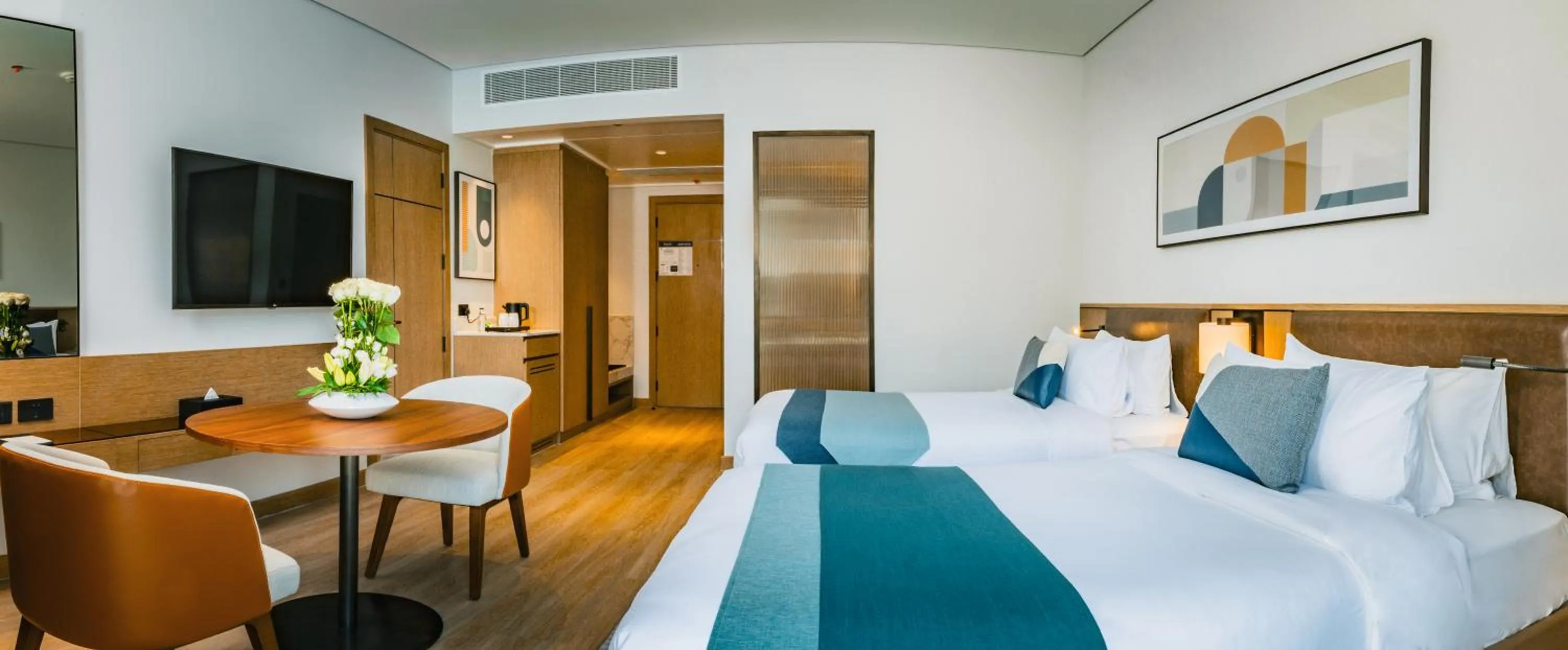 Bed in First Grand Hotel