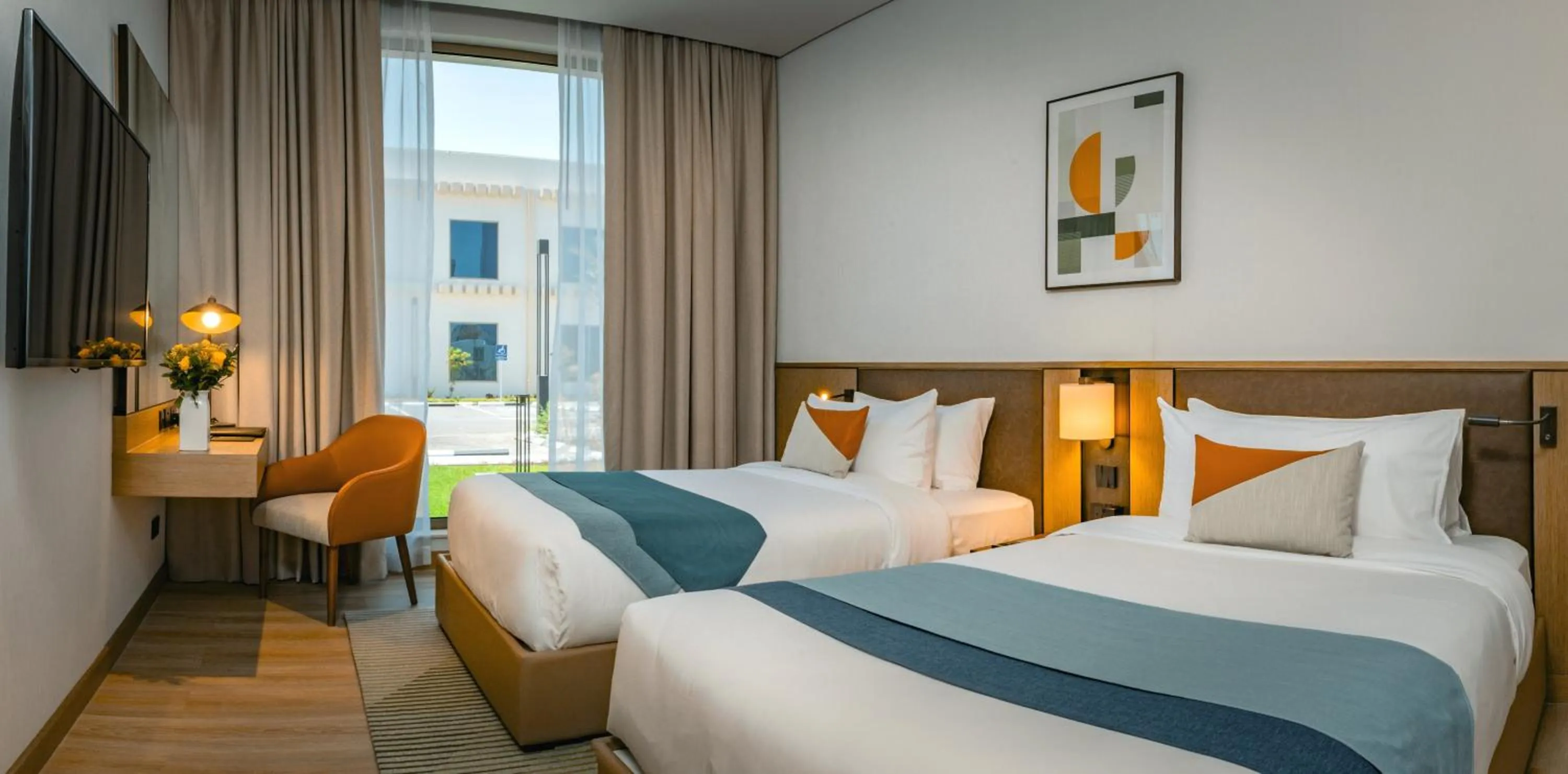 Bed in First Grand Hotel