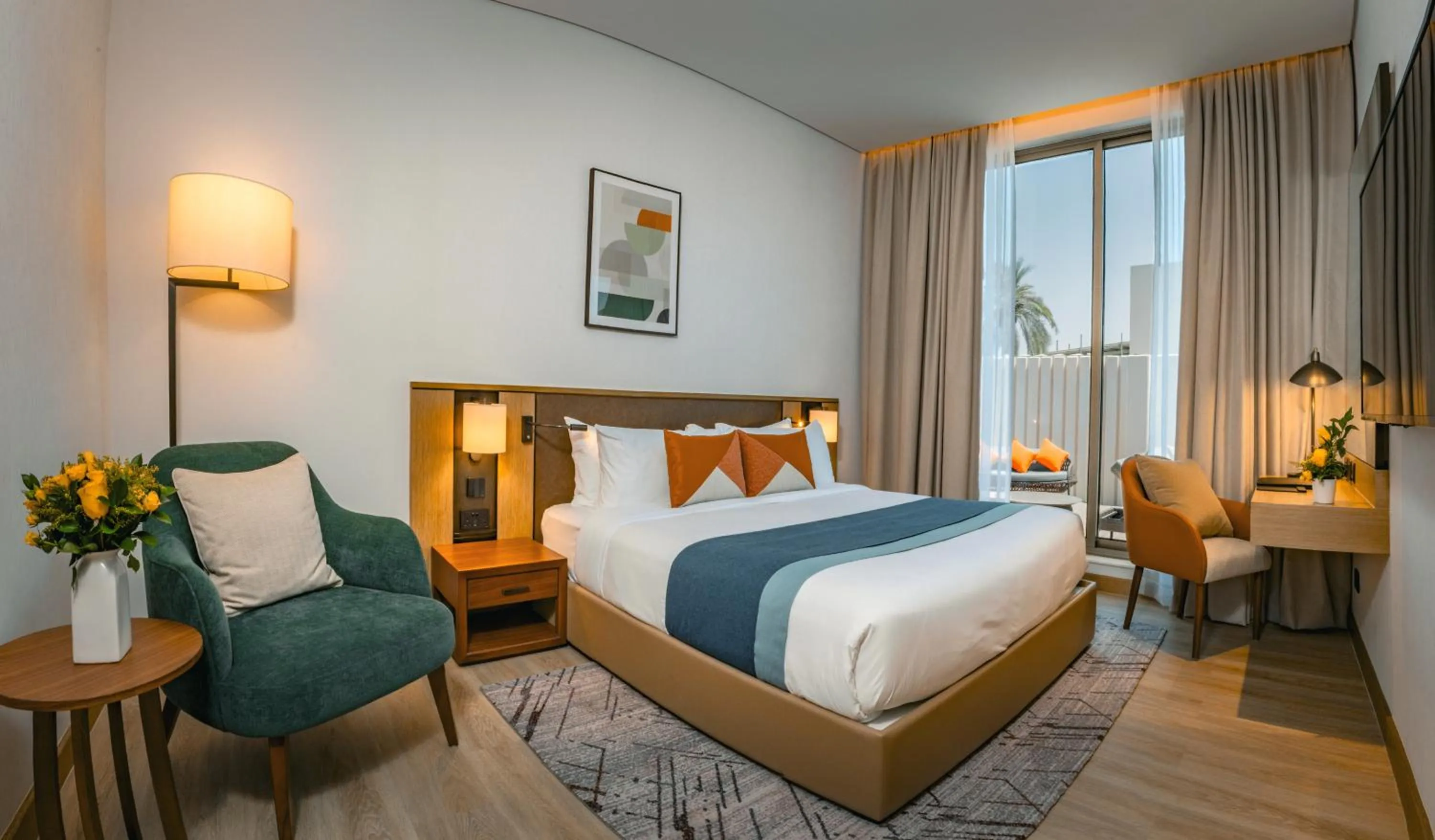 Bed in First Grand Hotel