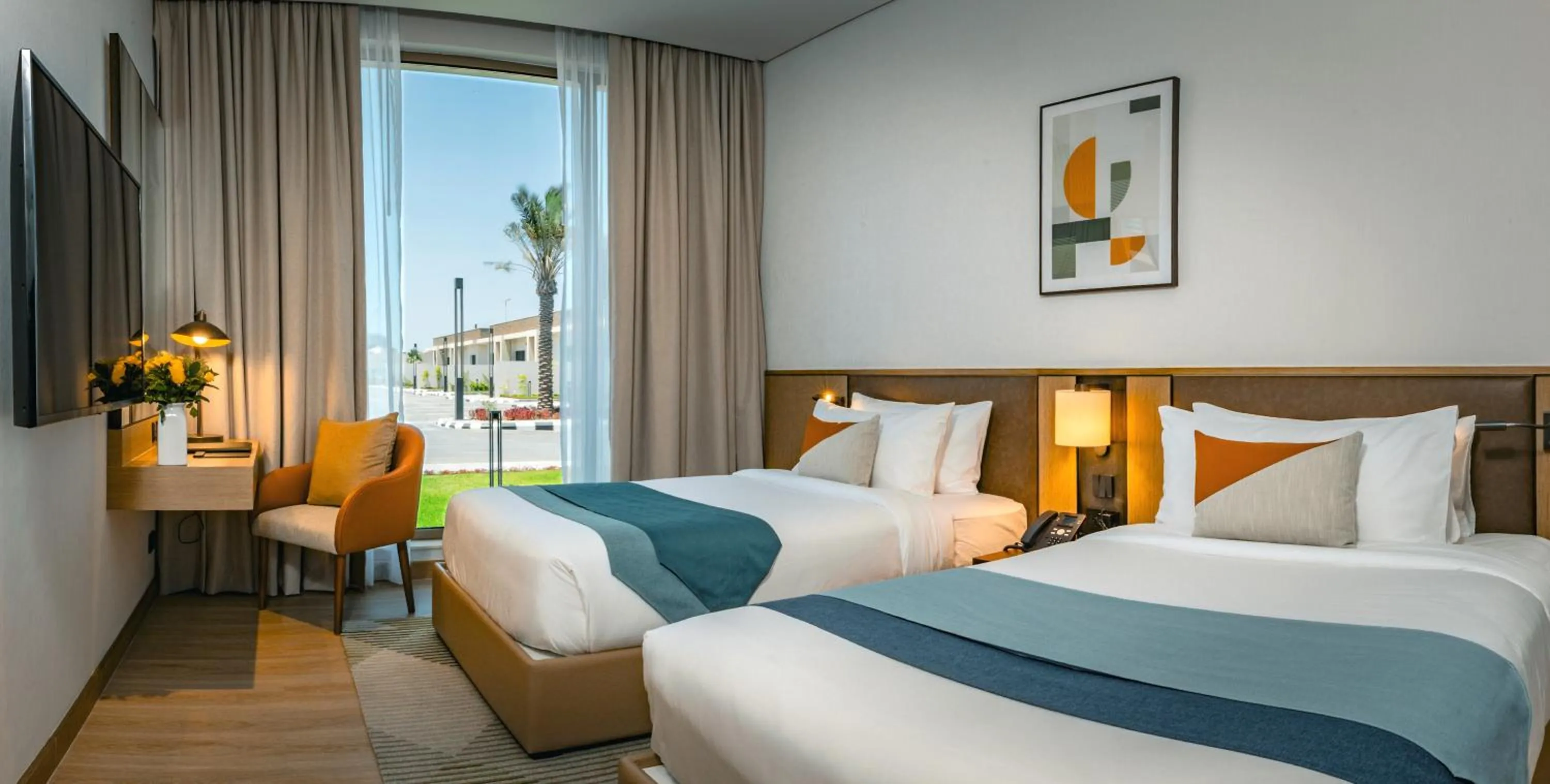 Bed in First Grand Hotel