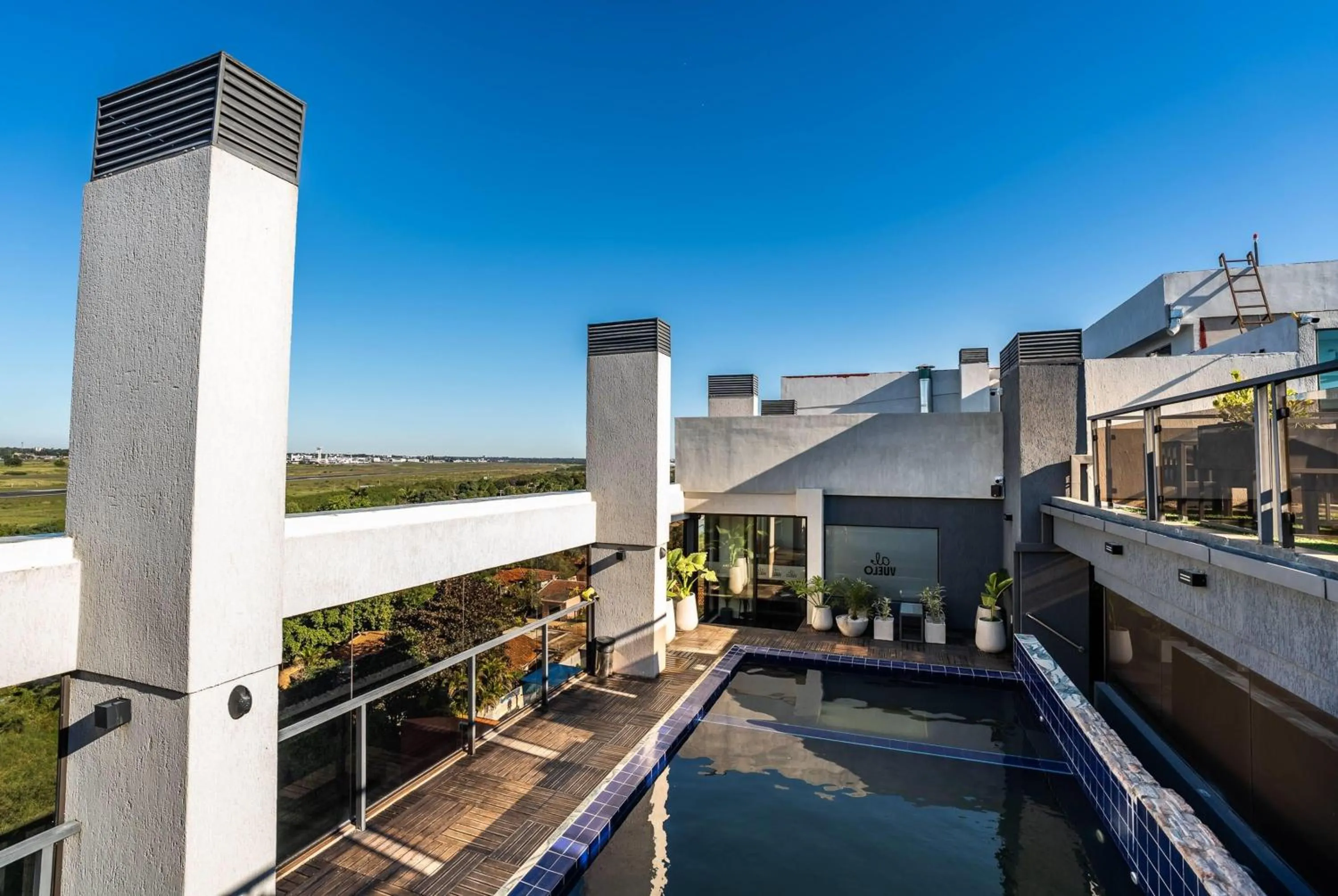 Pool view in Ramada Suites by Wyndham Asuncion Aeropuerto