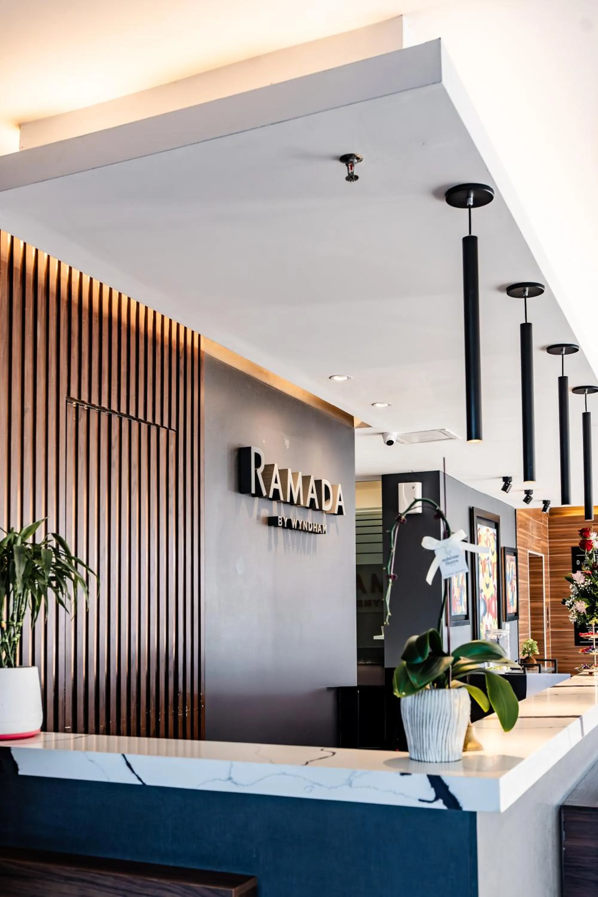 Lobby or reception in Ramada Suites by Wyndham Asuncion Aeropuerto