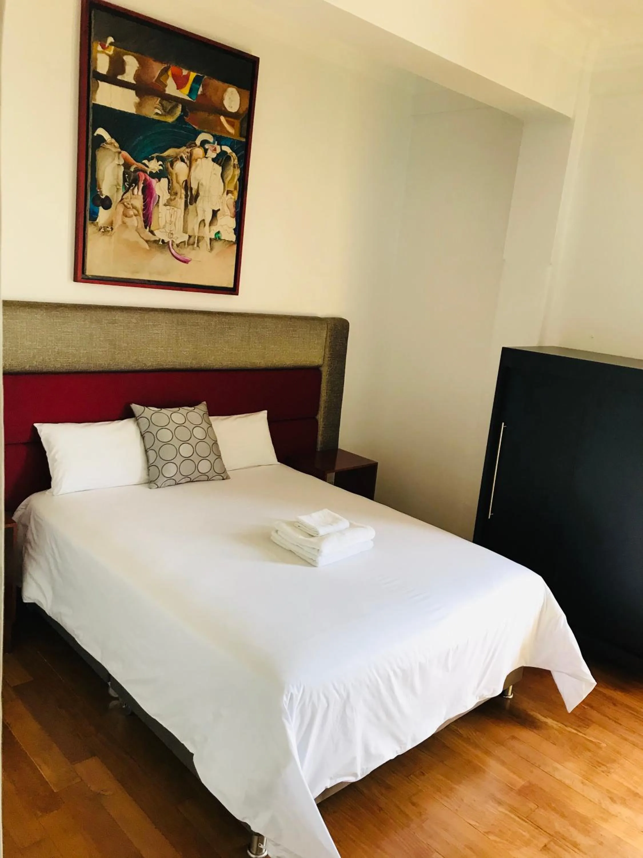 Bed in Larq'a Park Rooms