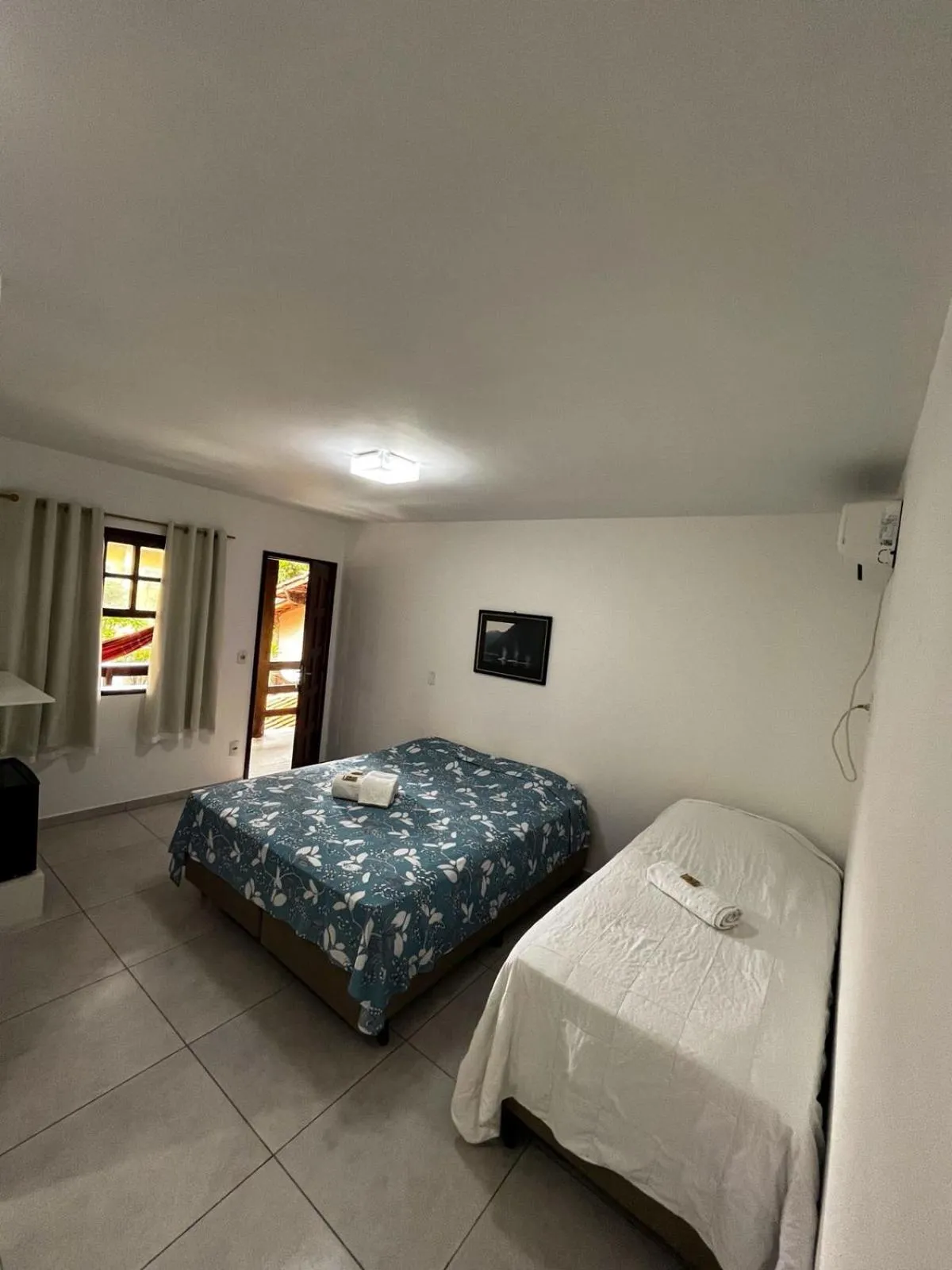 Bed in Solar da Praia Pousada