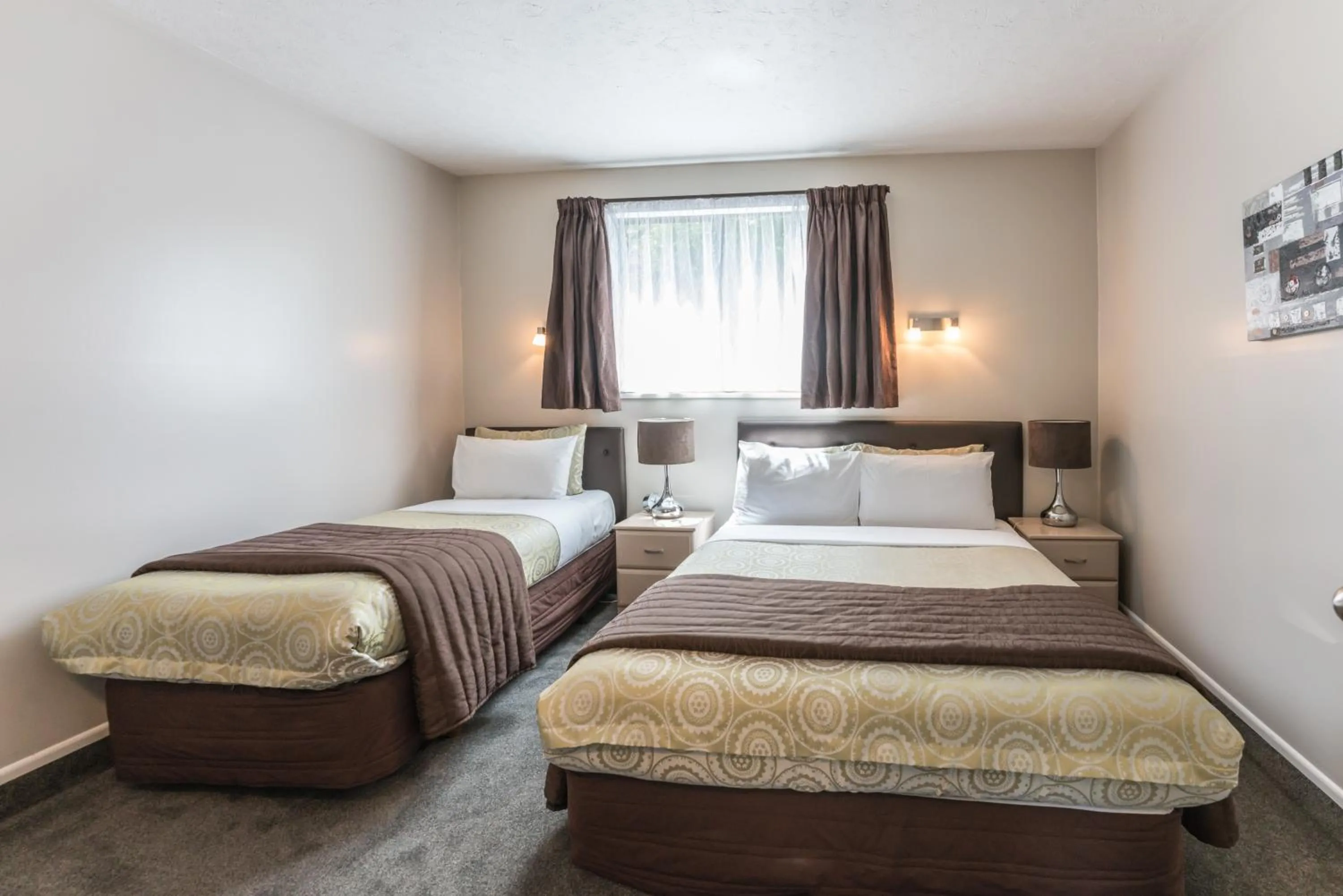 Bed in Strathern Motor Lodge