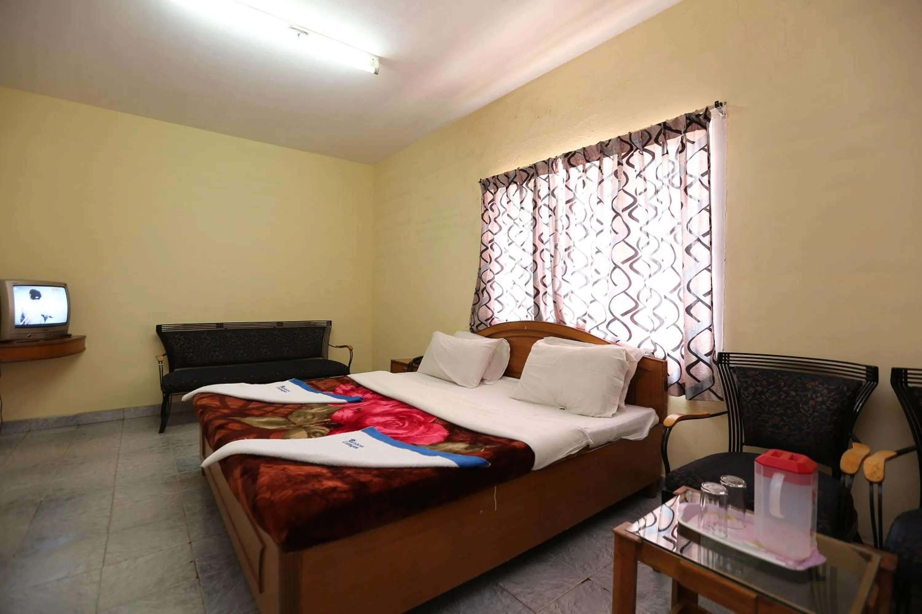 Photo of the whole room, Bed in Rainbow Cottages-Budget Friendly rooms