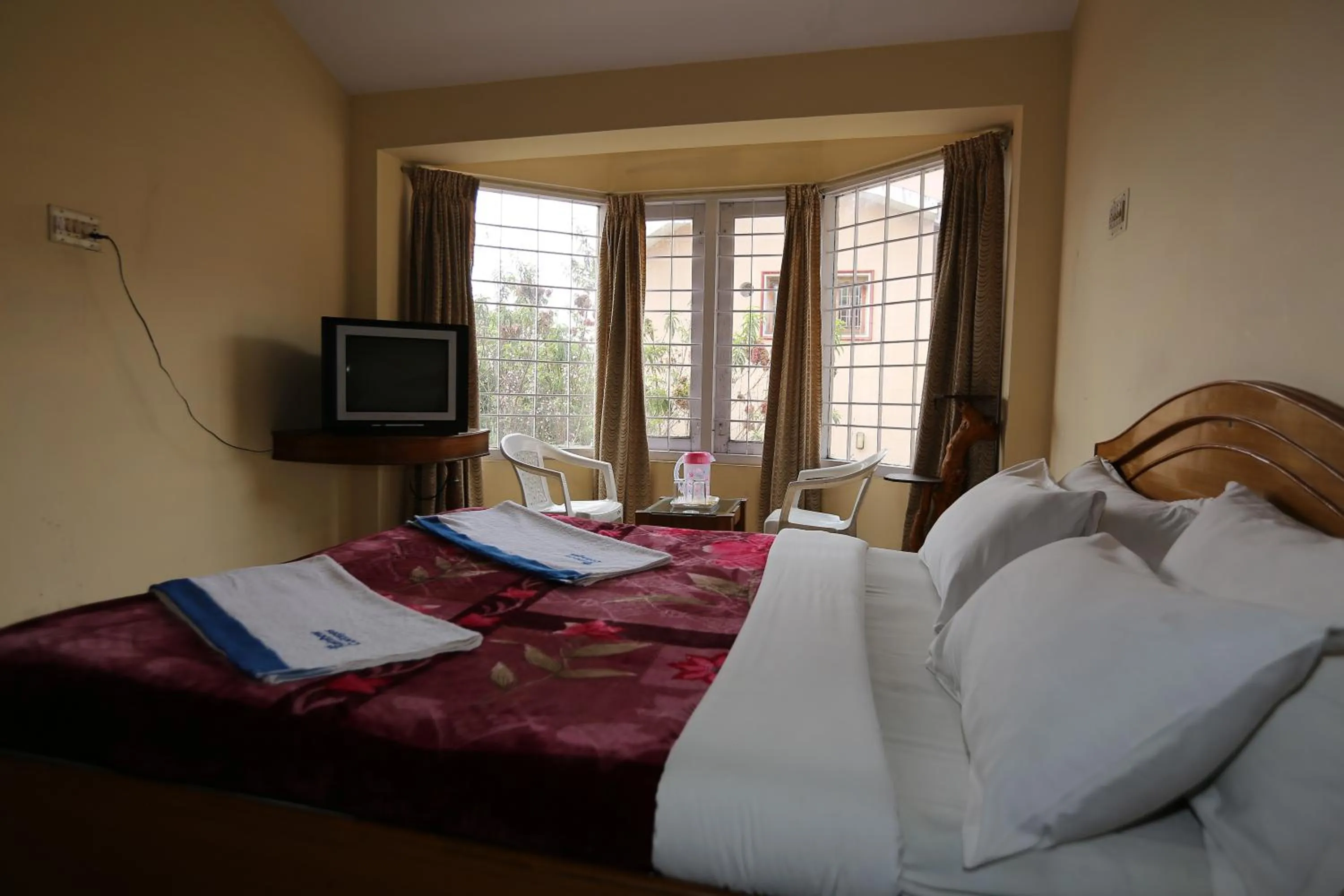 Day, Bed in Rainbow Cottages-Budget Friendly rooms