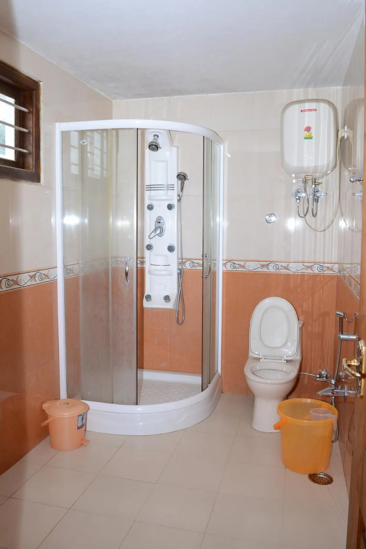 Toilet in Rainbow Cottages-Budget Friendly rooms