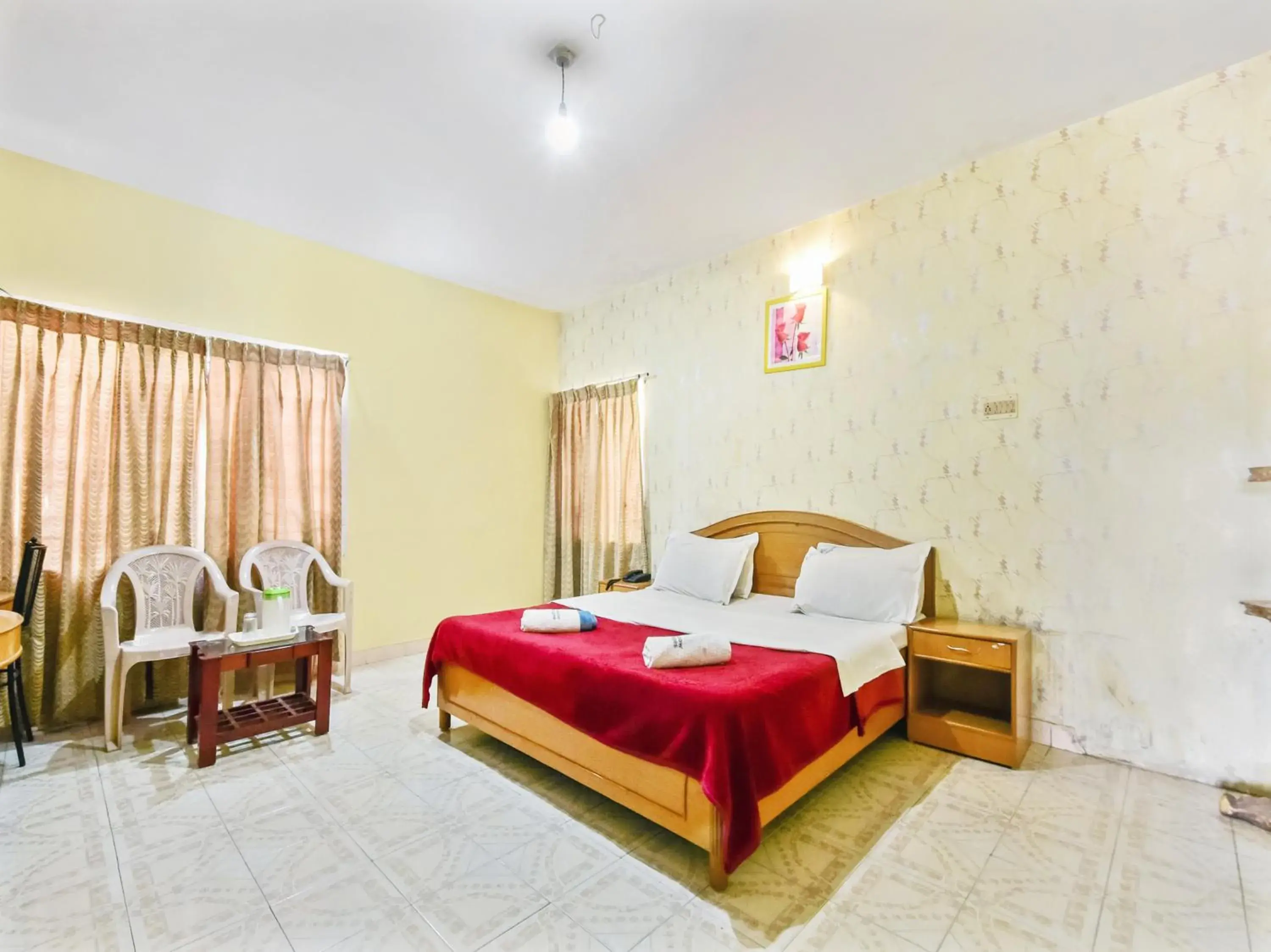 Super Deluxe Double Room in Rainbow Cottages-Budget Friendly rooms Super Deluxe Double Room in Rainbow Cottages-Budget Friendly rooms