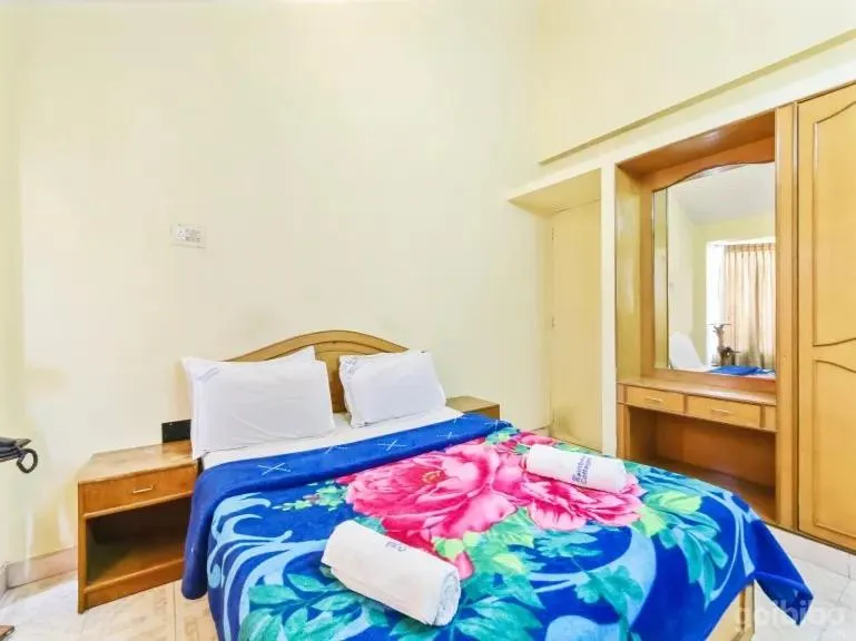 Bed in Rainbow Cottages-Budget Friendly rooms