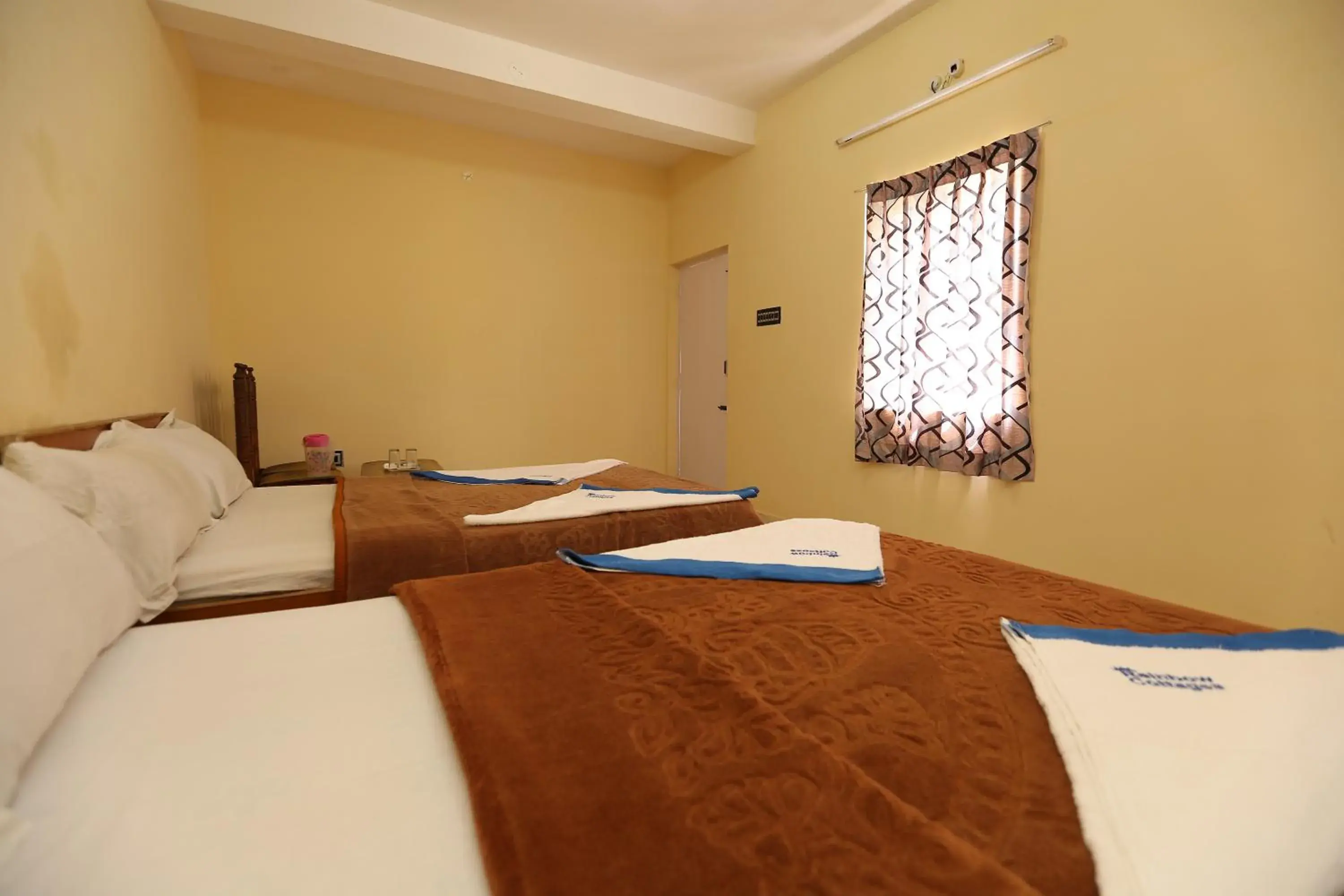 Quadruple Room in Rainbow Cottages-Budget Friendly rooms Quadruple Room in Rainbow Cottages-Budget Friendly rooms
